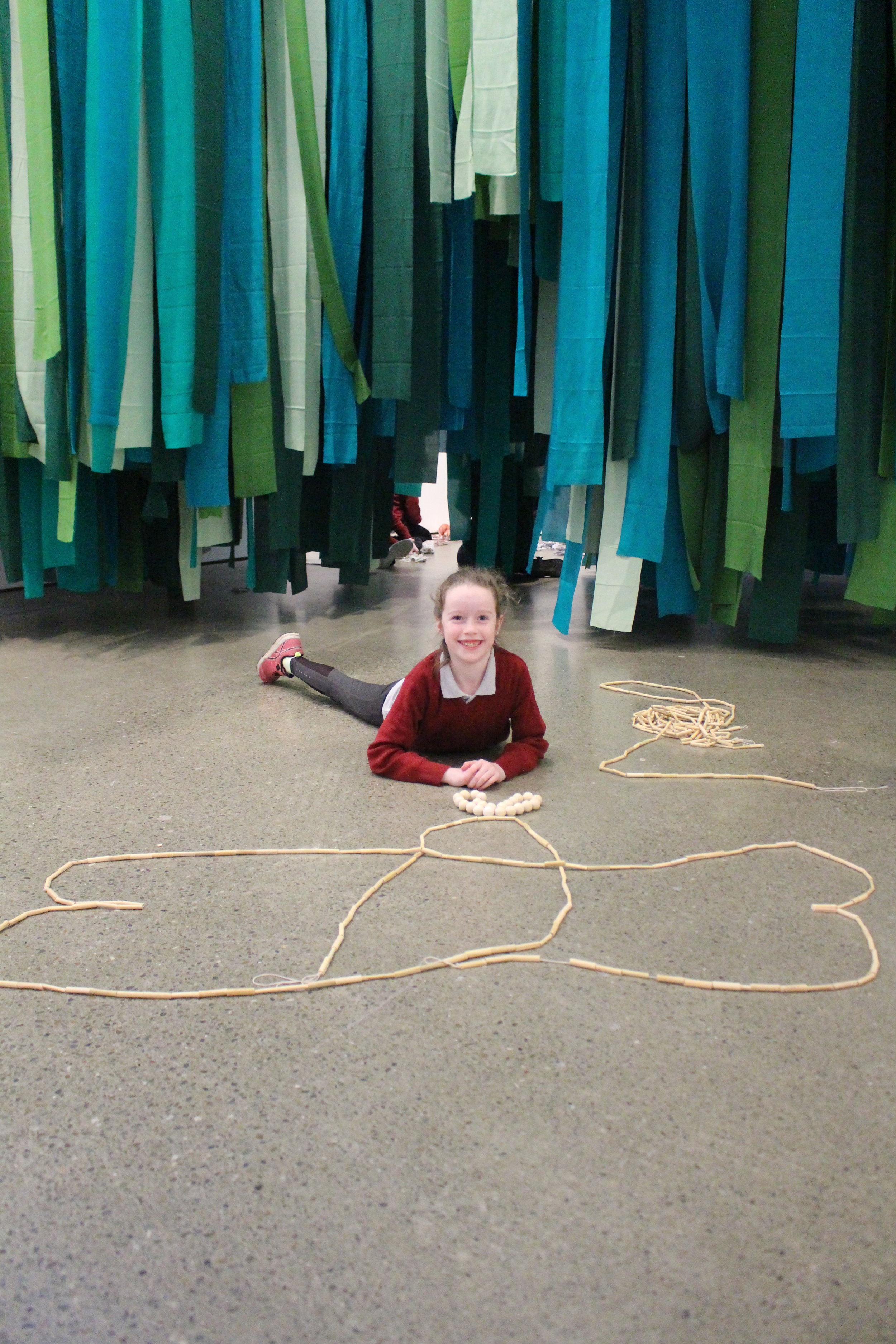  Drawing on the floor with a beaded line, one of the ‘mobile elements’ in Caoimhe Kilfeather’s body of work 
