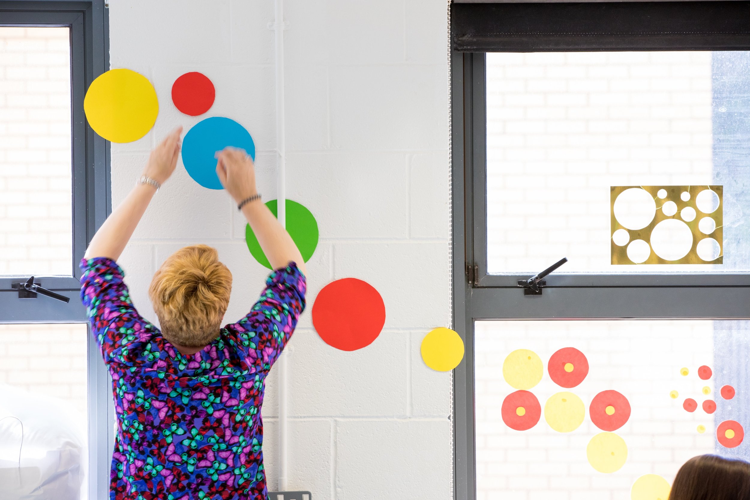  Responding to work of artist Yayoi Kusama, using line to draw across the classroom and in doing so  transforming the space of the classroom 