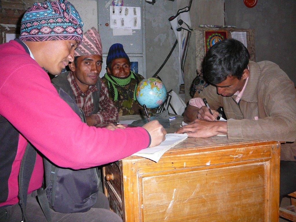 Signing maintinace contract with the villagers for timily maintinance.jpg