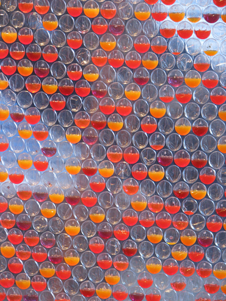 New partitions were clad in bubble wrap, 40,000 cells of which were injected with diluted ink. 