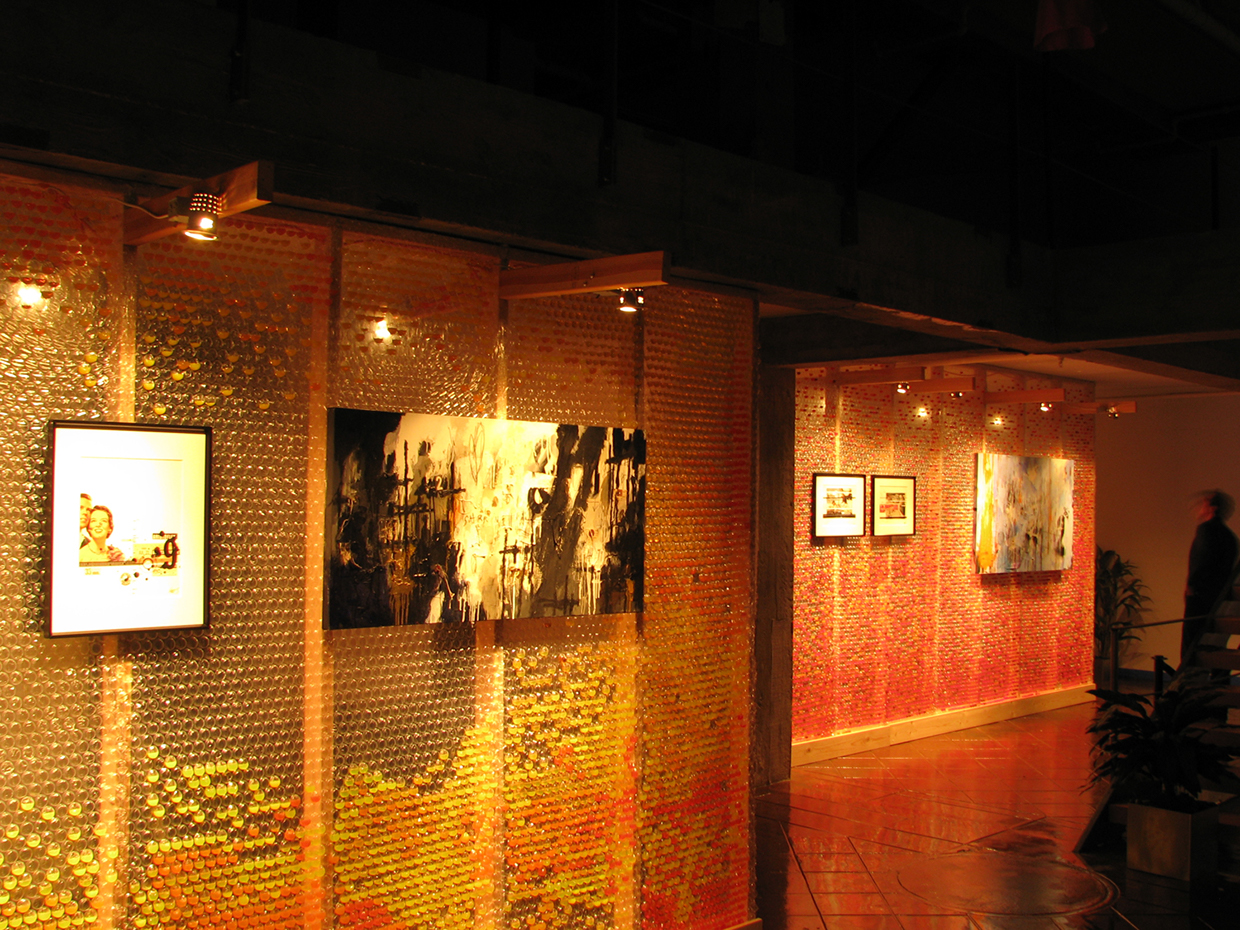 With new lighting attached to the partition,the reflective, irridescent wall itself illuminated the entire space. A novel version of the stud-framed "wet wall," the bubble wrap invited poking and prodding, rippling with every disturbance. 