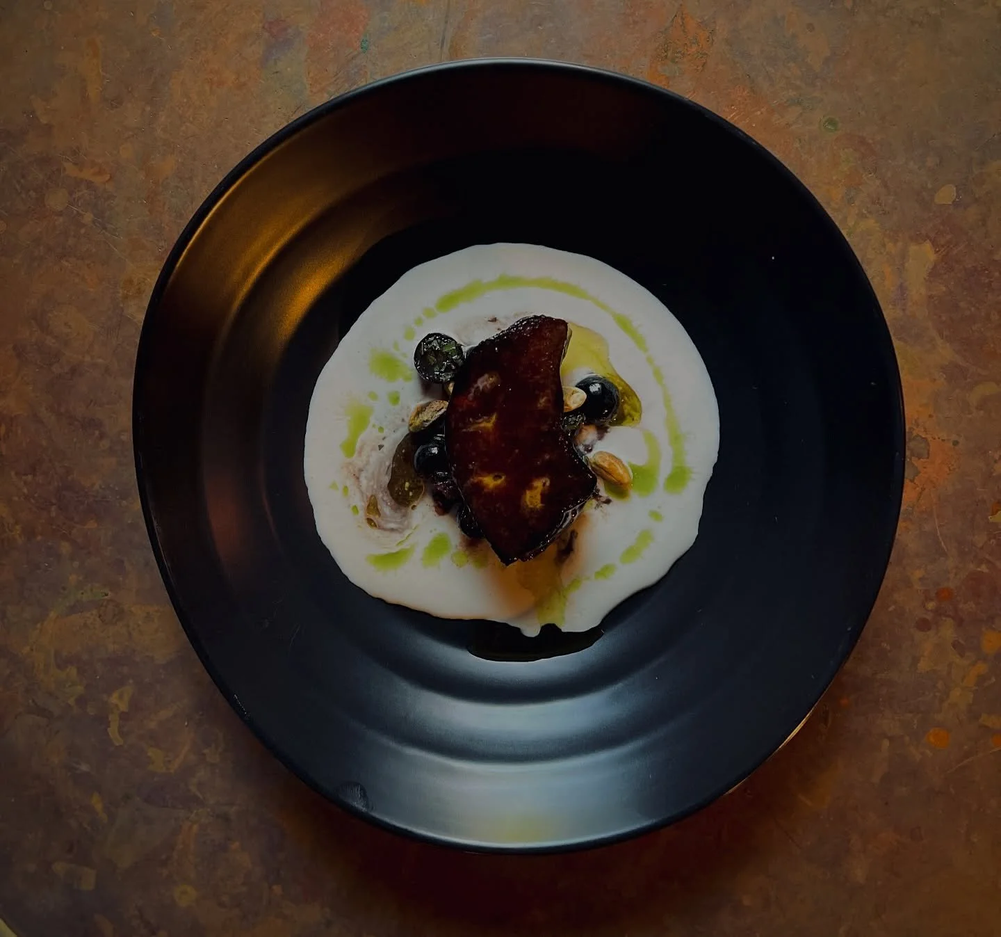 SEARED FOIE GRAS 

concord grapes + figs + shiso 
white gazpacho + pistachio