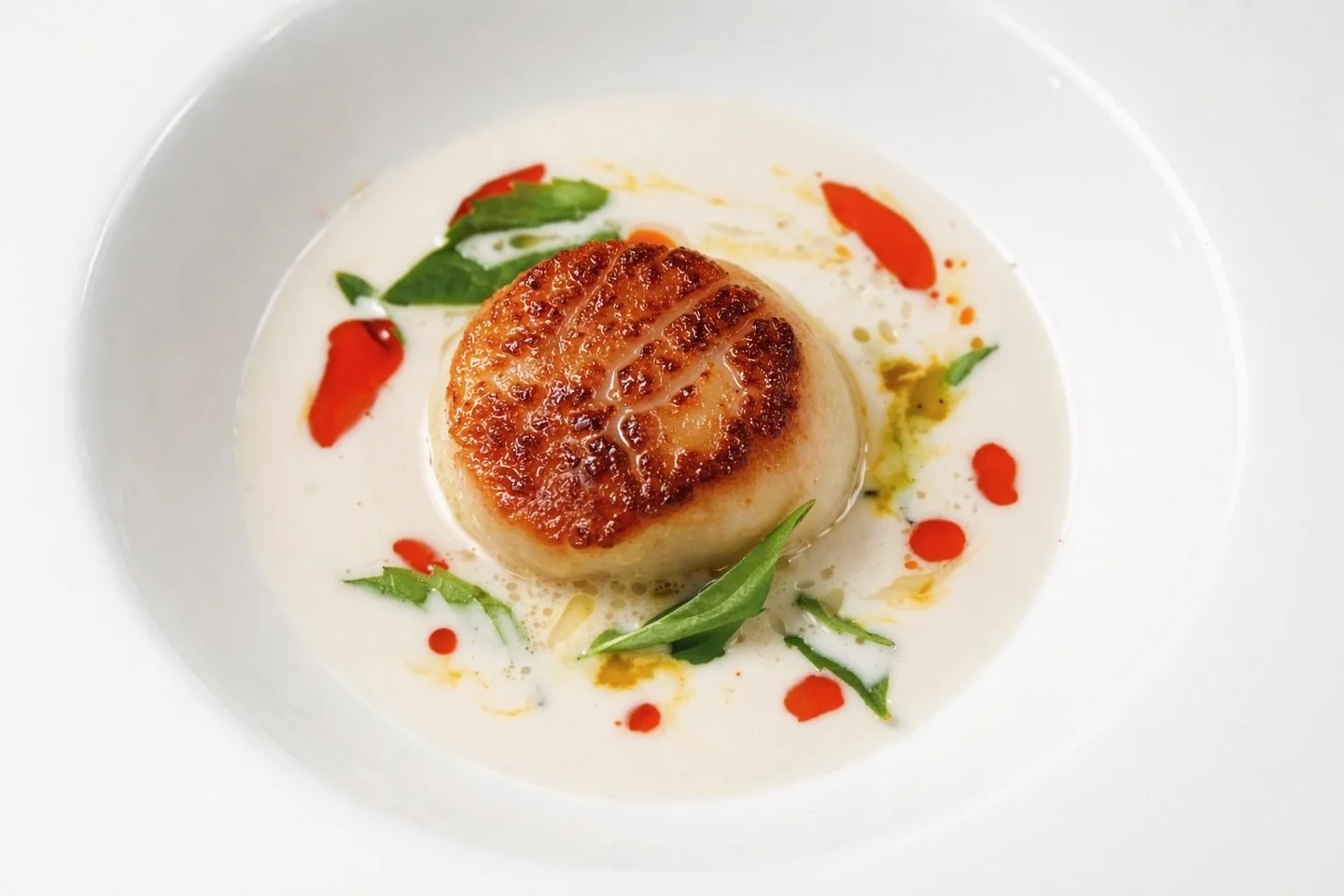 CARAMELIZED SEA SCALLOP
coconut + passionfruit + smoked chili oil 
lemongrass &amp; limeleaf