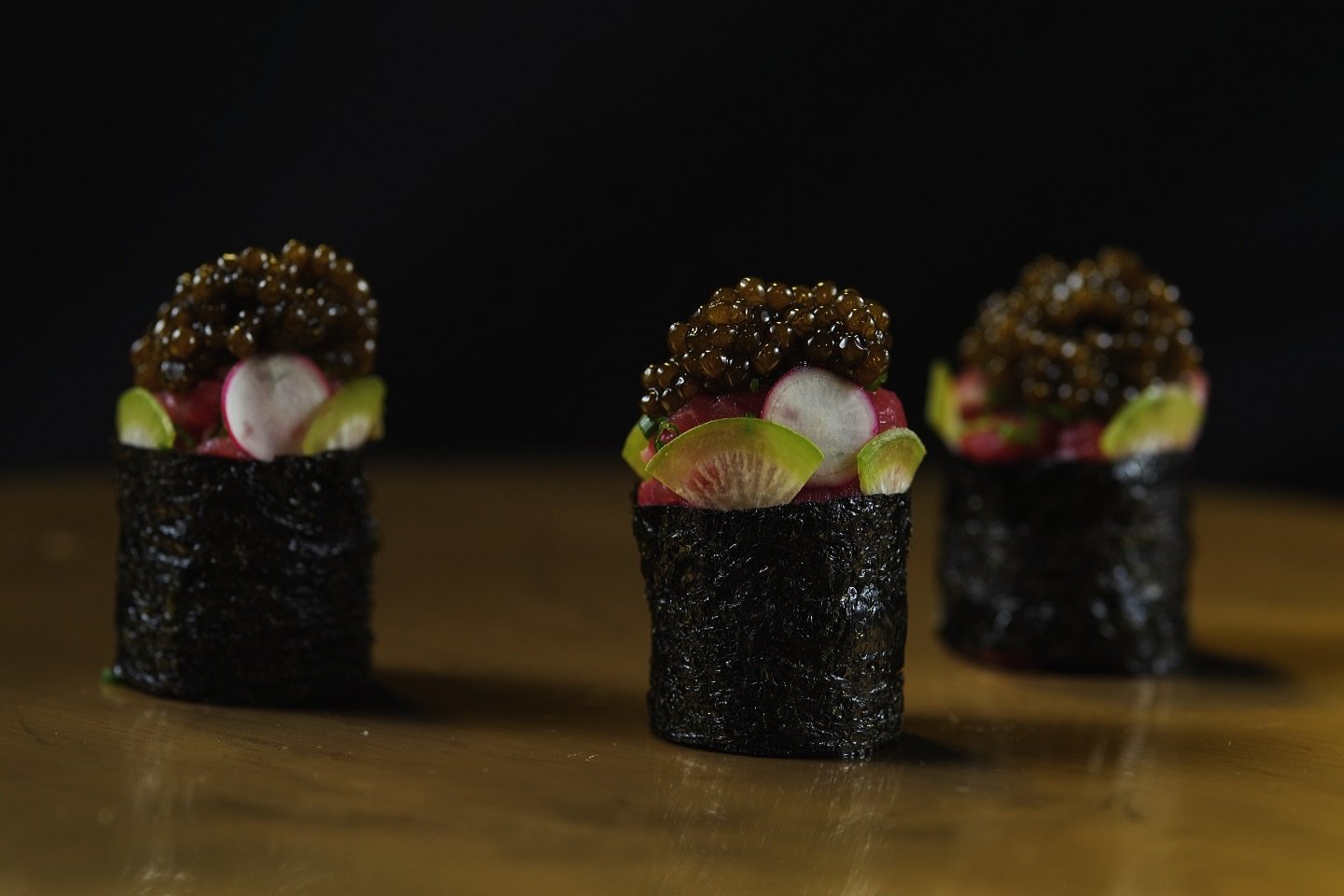 TUNA &amp; KALUGA 
crispy nori cylinders + lime radish + tosazu + chives