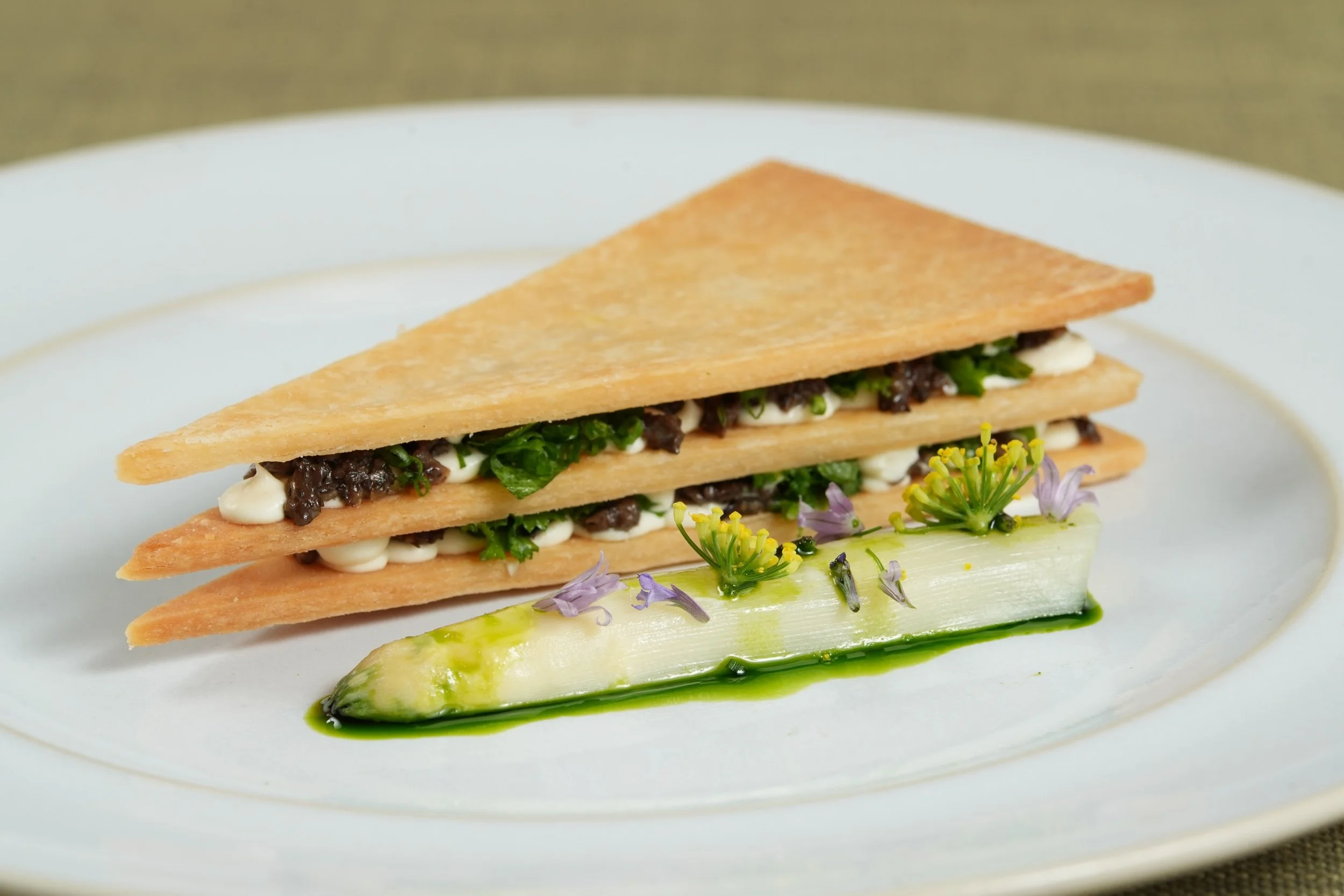 ALTERNATING FIRST COURSE 
(for @atlasfellows at @themuseumofmodernart)

WILD MOREL MILLEFIEULLE
pressed puff pastry + mustard greens + potato leek cream 

AND

SPRING MEADOW
asparagus spears &amp; scales + whipped ch&egrave;vre domes + fiddleheads