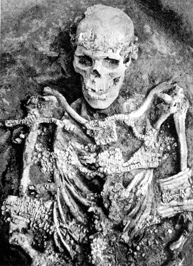 The skeleton of a man aged 60 covered by mammoth ivory beads, found at at Sungir, an archaeological site dating to 26,000 - 28,000 BCE, near present-day Moscow, Russia, 