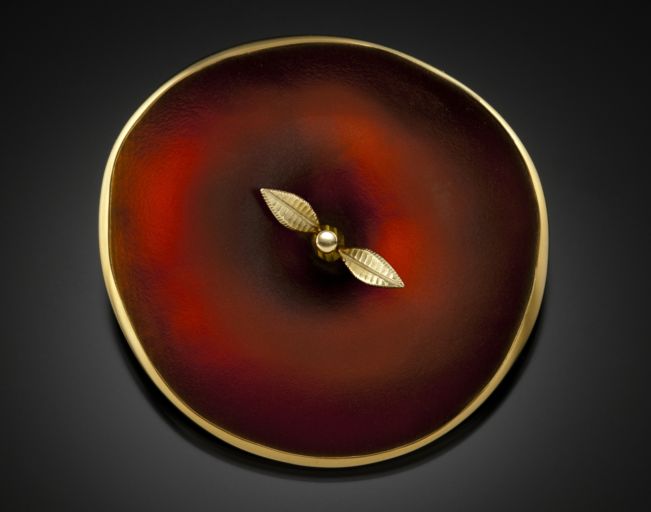 A cast glass and 18 karat gold brooch by American studio jeweler Donald Friedlich, to be shown by Hedone Gallery at GlassWeekend 2015. 