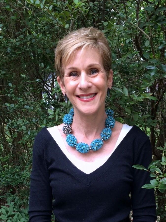 Bonnie Levine, owner of Hedone Gallery, wearing Valerie's "Sea Green Ovals" Necklace, June, 2015. Bonnie says: "I've been a big fan of Valerie's work for 23 years. The first piece of studio jewelry my husband ever gave me was this beautiful brooch in 1993, and I've been a major fan with her bead work ever since. The way she combines simple forms with color, texture, unique beads,and unparalleled attention to detail to create beautiful pieces of jewelry is unparalleled - she is a master! On our recent 20th anniversary, my husband presented me with this major necklace of sea green Czech glass beads - what an amazing piece. It's very special to have a 23-year connection to Valerie!" 