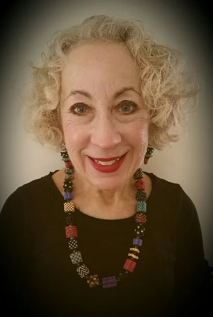 Barbara P., we aring one of my early One of a Kind necklaces, March, 2015. Barbara says: "When I first discovered your beautiful hand-crafted beaded designs about 20 years ago, I knew that I found a very special designer! I now own many of your exquisite pieces and they give me immense pleasure whenever I wear them. Without question, your work has become my most prized jewelry collection and I receive compliments wherever I go. Your beaded design “elements” or “modules” permit me to be creative and outfit. As beautiful as your designs are and how happy I feel whenever I wear them, knowing you over 20 years has also been a gift and a distinct pleasure. Although my husband Mark and I only see you at shows, you are a part of us and you will always be remembered as one of the nicest and most talented people we have ever known. Thank you Valerie!" 
