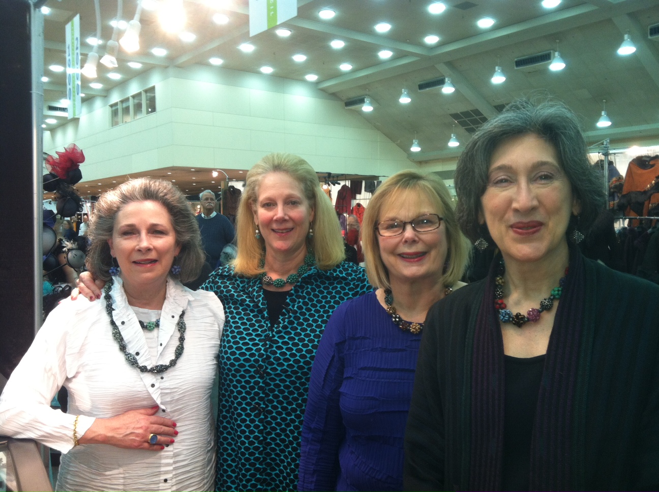 Left to right: Tina Houston, Nancy Smith, Sharon Fawcett, Miriam Nisbet, American Craft Show, Baltimore, MD, Feb., 2014. The Ladies Say: "We are four friends who have been coming to Valerie for many years. What we love about her is how distinctive her work is. So many people we encounter when wearing her pieces recognize her work and appreciate her artistry. Other artists have told us how Valerie has shared her knowledge and helped them start their careers. Most of all we love the beauty and versatility of her work. Valerie's pieces make us happy when we wear them. We wear her pieces with everything. We delight in responding to the complements we receive on our jewelry by naming her as the artist who made the piece. Thank you Valerie for creating such lovely jewelry." 