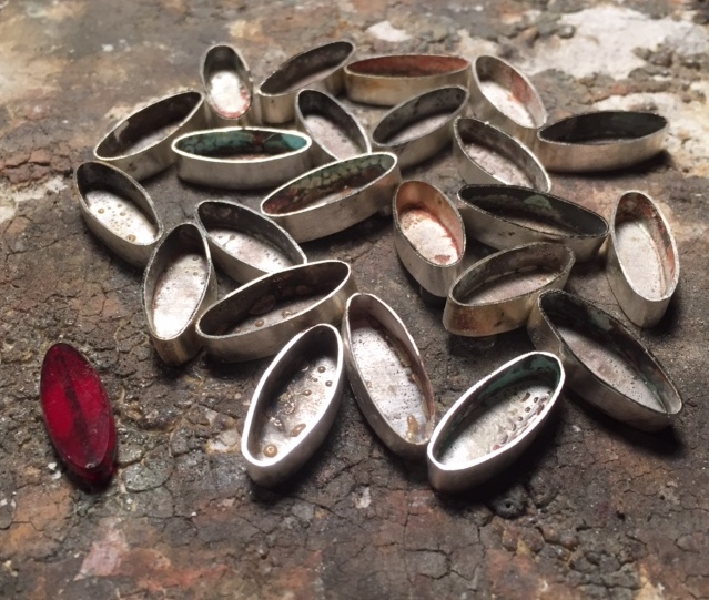The "Lotus/Alhambra" brooch in process, showing most of the sterling bezels I fabricated, one by one. 