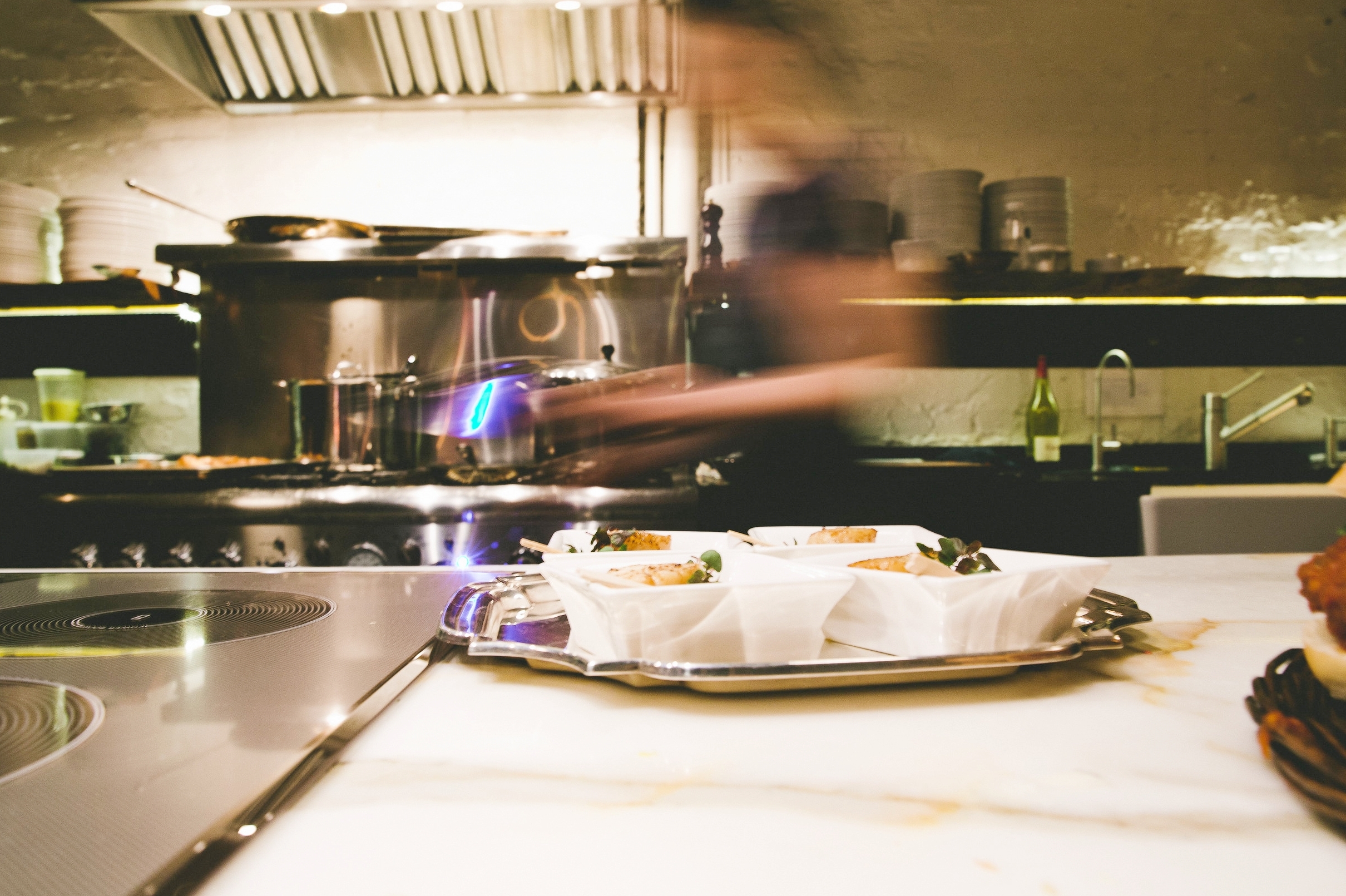 There is no glass wall here; the kitchen is part of the experience.