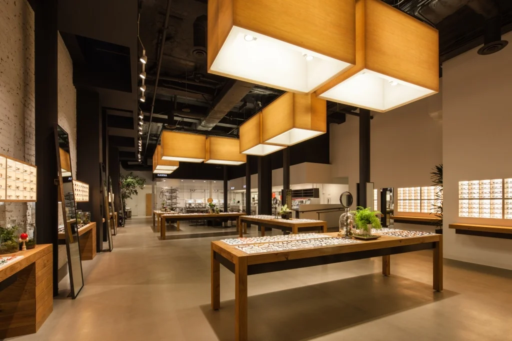 Jins Eyewear's elegant lighting and integrated design approach delivers a superior customer experience.