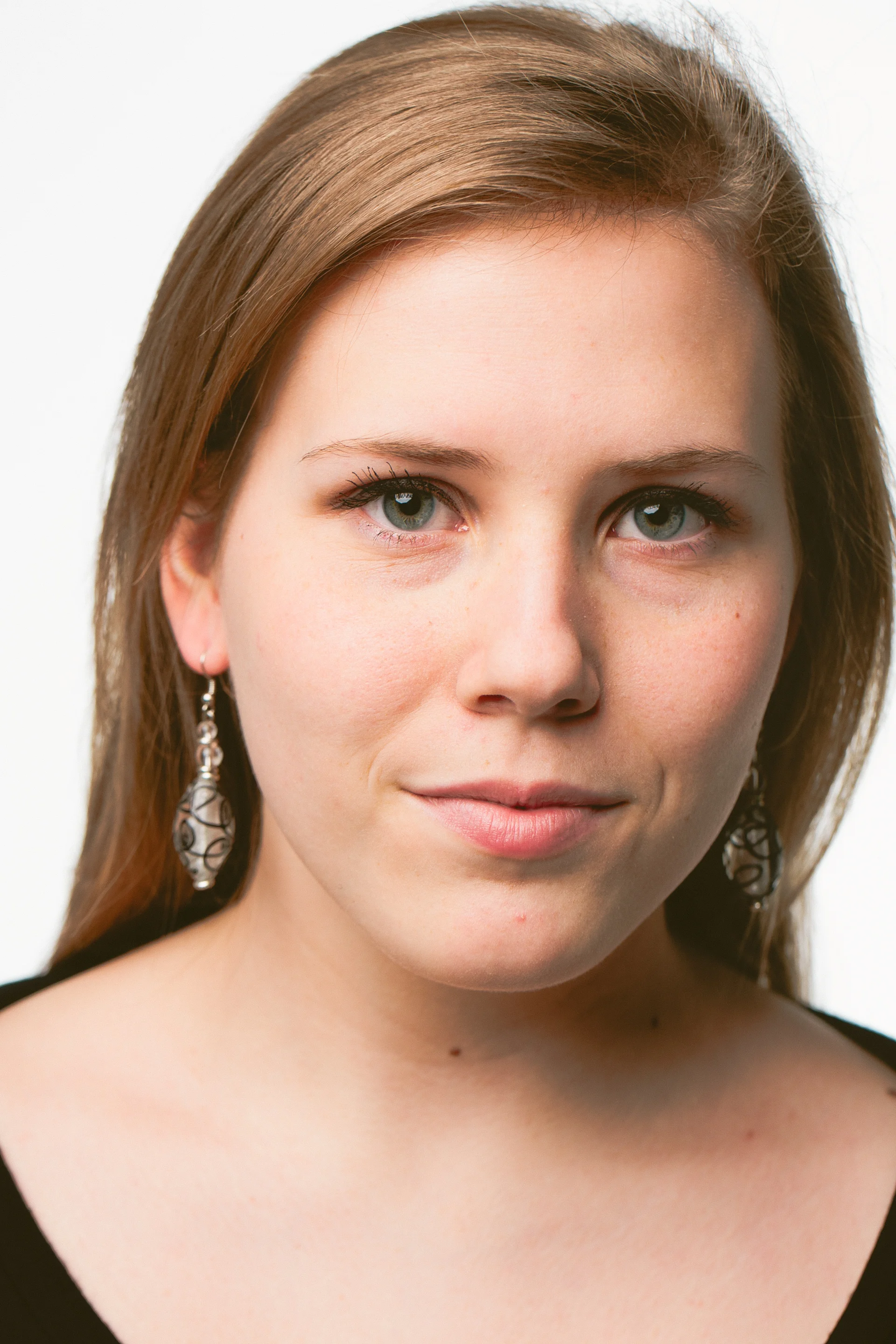modeled swirl earrings.jpg