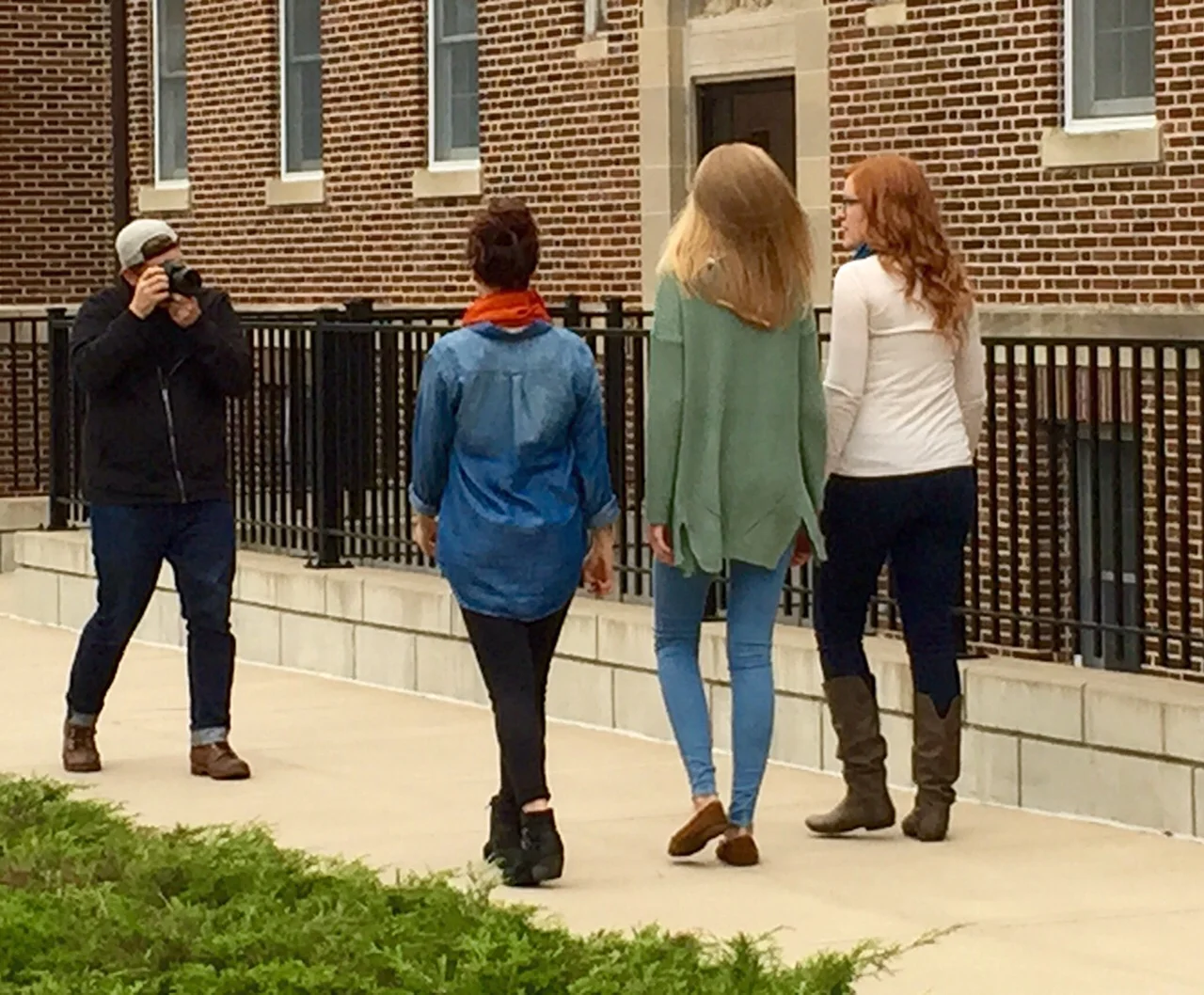 Photographer Guytano Magno with models (left to right) Megan Whiting, Piper Mork & Jenna Luttio
