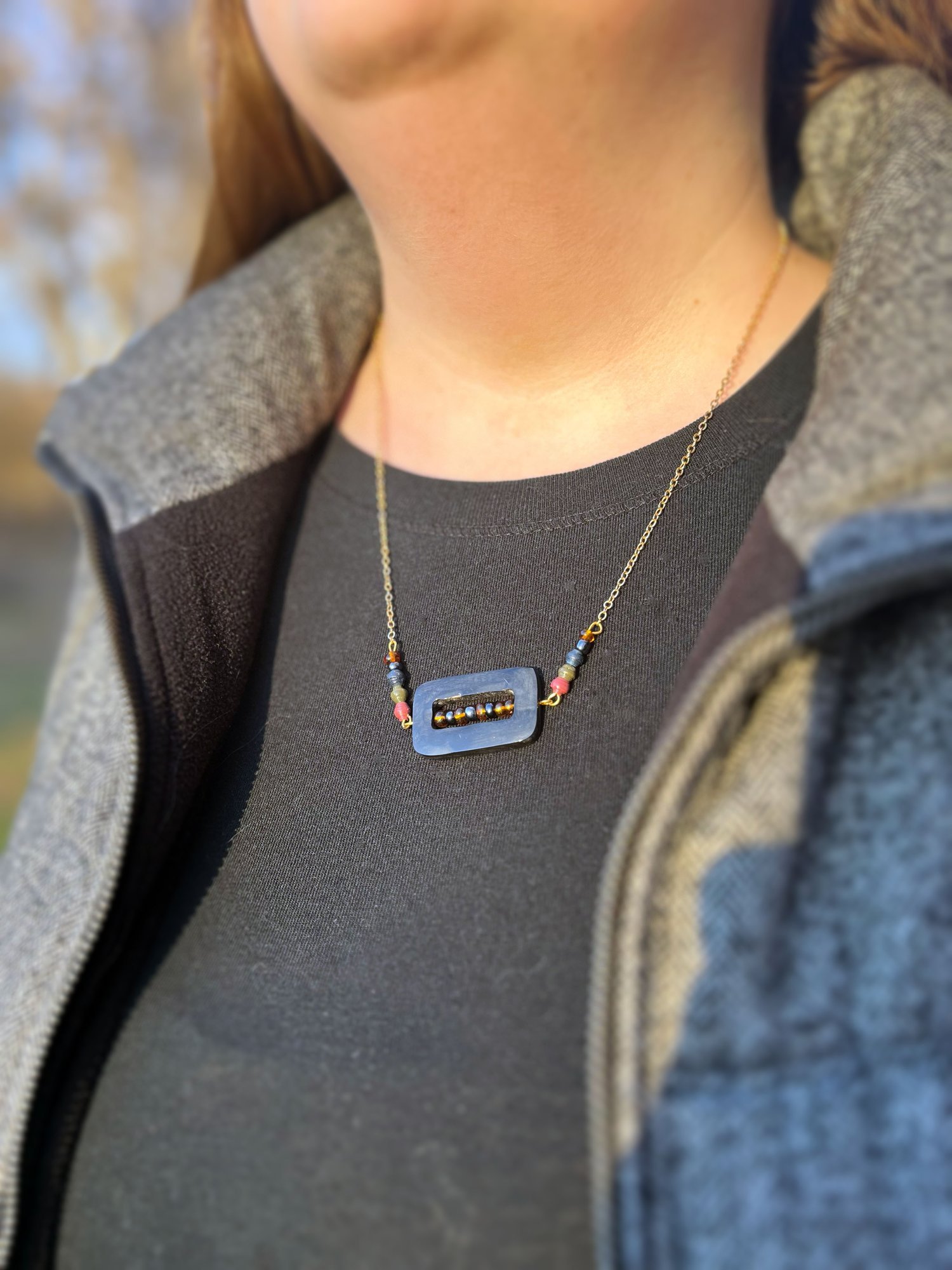 This necklace is a colorful versatile piece made in Rwanda by DuHope. DuHope is equipping women with skills in jewelry-making and soap-making in order to help them earn a living. Support this cause by buying this necklace and more of their product th