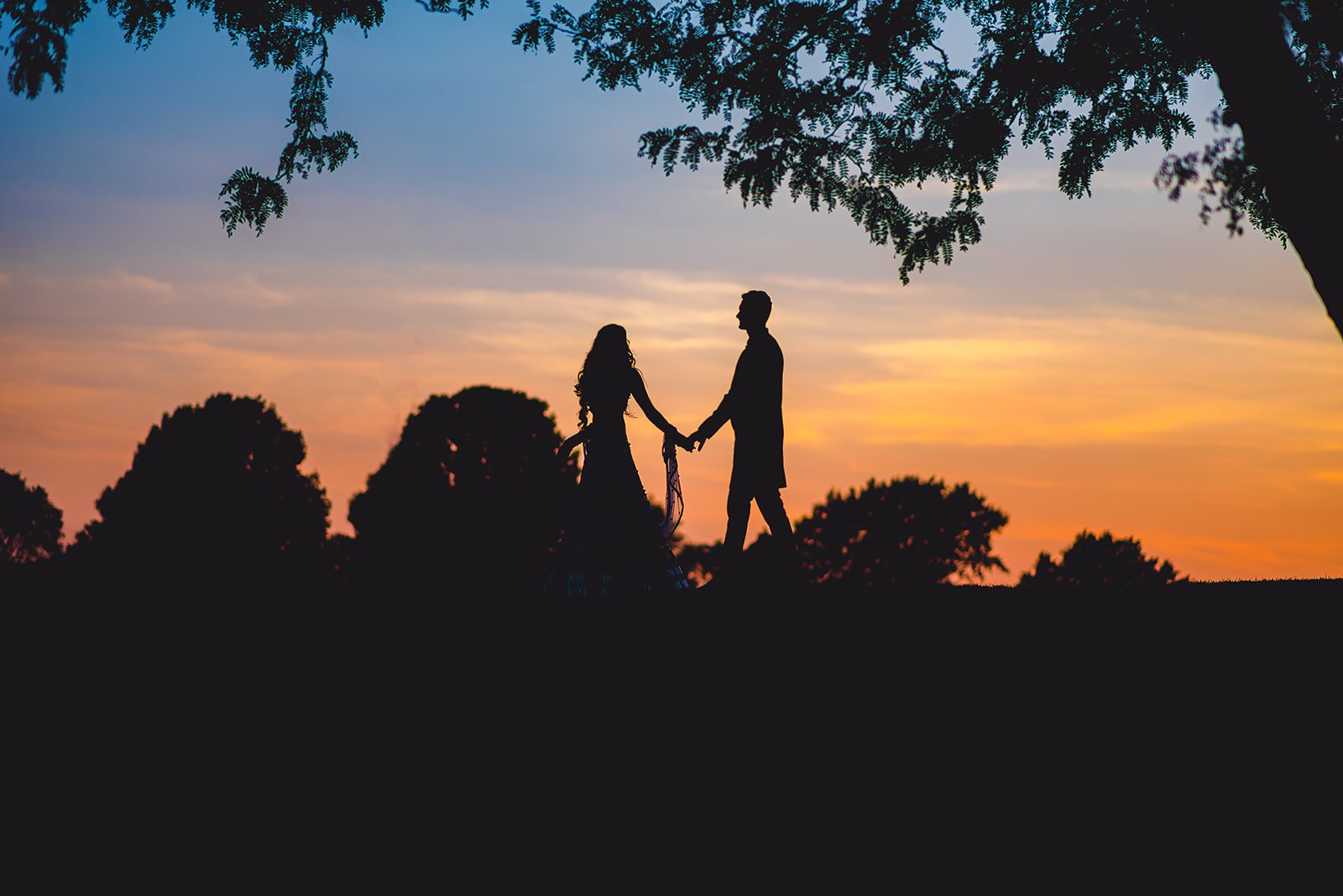  South Asian Indian Wedding Couple Silhouette sunset 