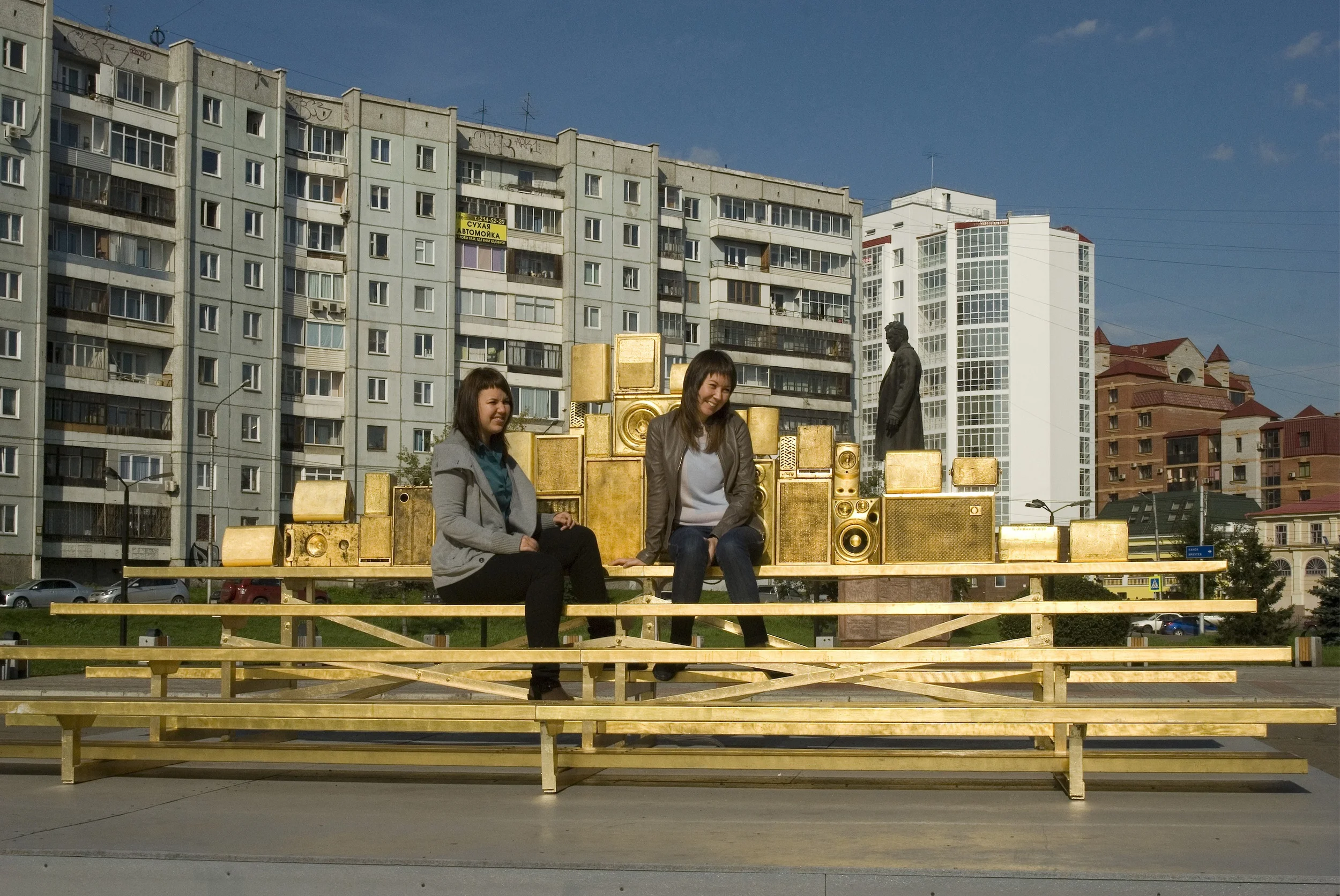 Almost Antipodeans (Krasnoyarsk), 2013 6 ft x 17 ft x 6 ft aluminum bleachers, gold leaf, speakers, laptop, 10 minute 16-channel sound part of X Krasnoyarsk Biennial (Krasnoyarsk, RUS), presented in conjunction with BAM/Prokhorov Foundation