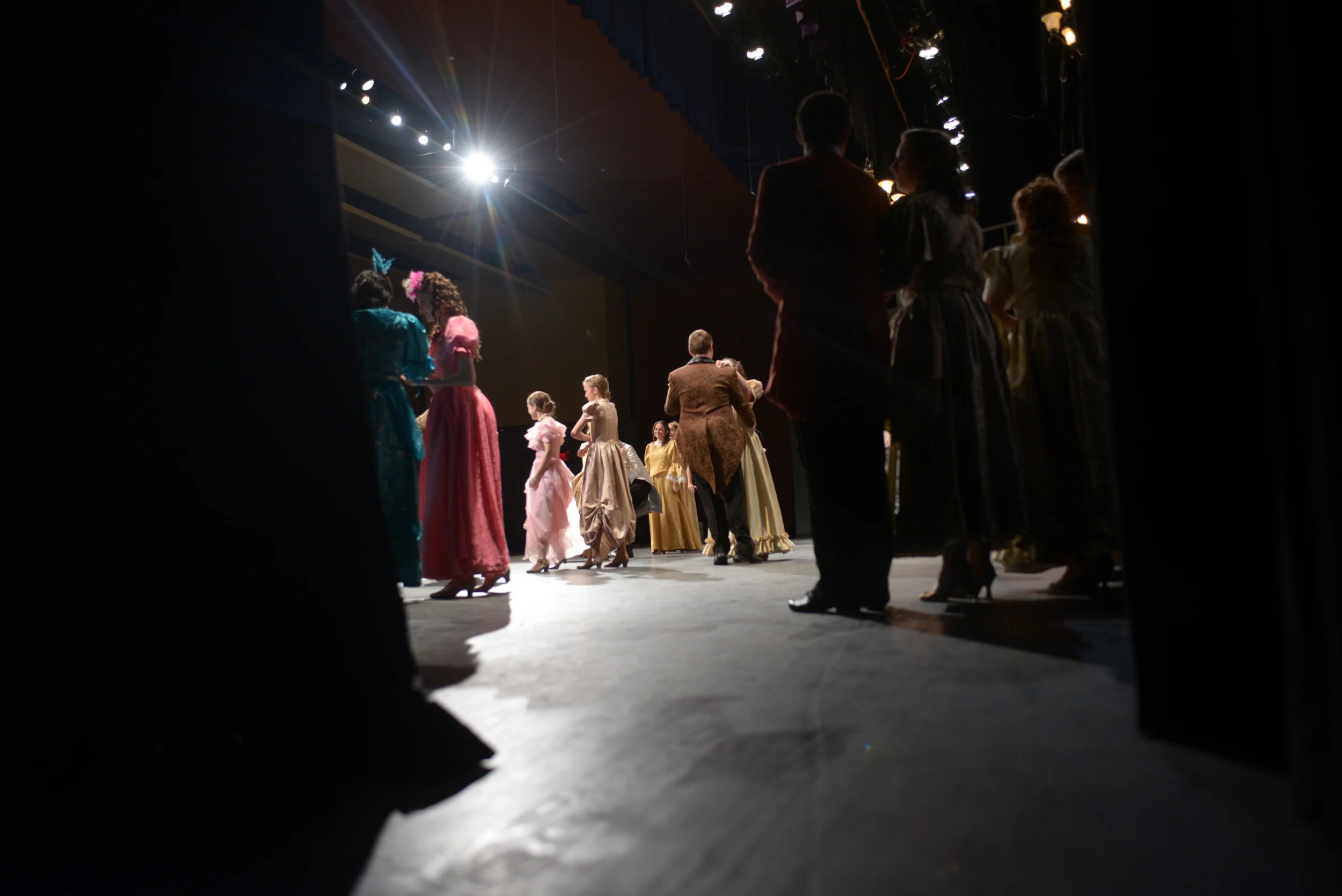  The cast of Battle's musical production 'Cinderella' socialize on stage during the ball scene on Saturday, Nov. 15, 2014. 