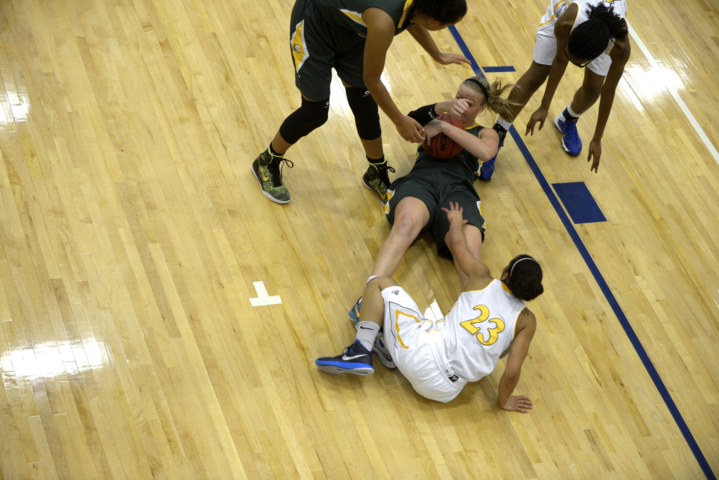 Rock Bridge guard fights&nbsp;for the ball during a basketball game against Battle High School&nbsp;held at Battle High School. 