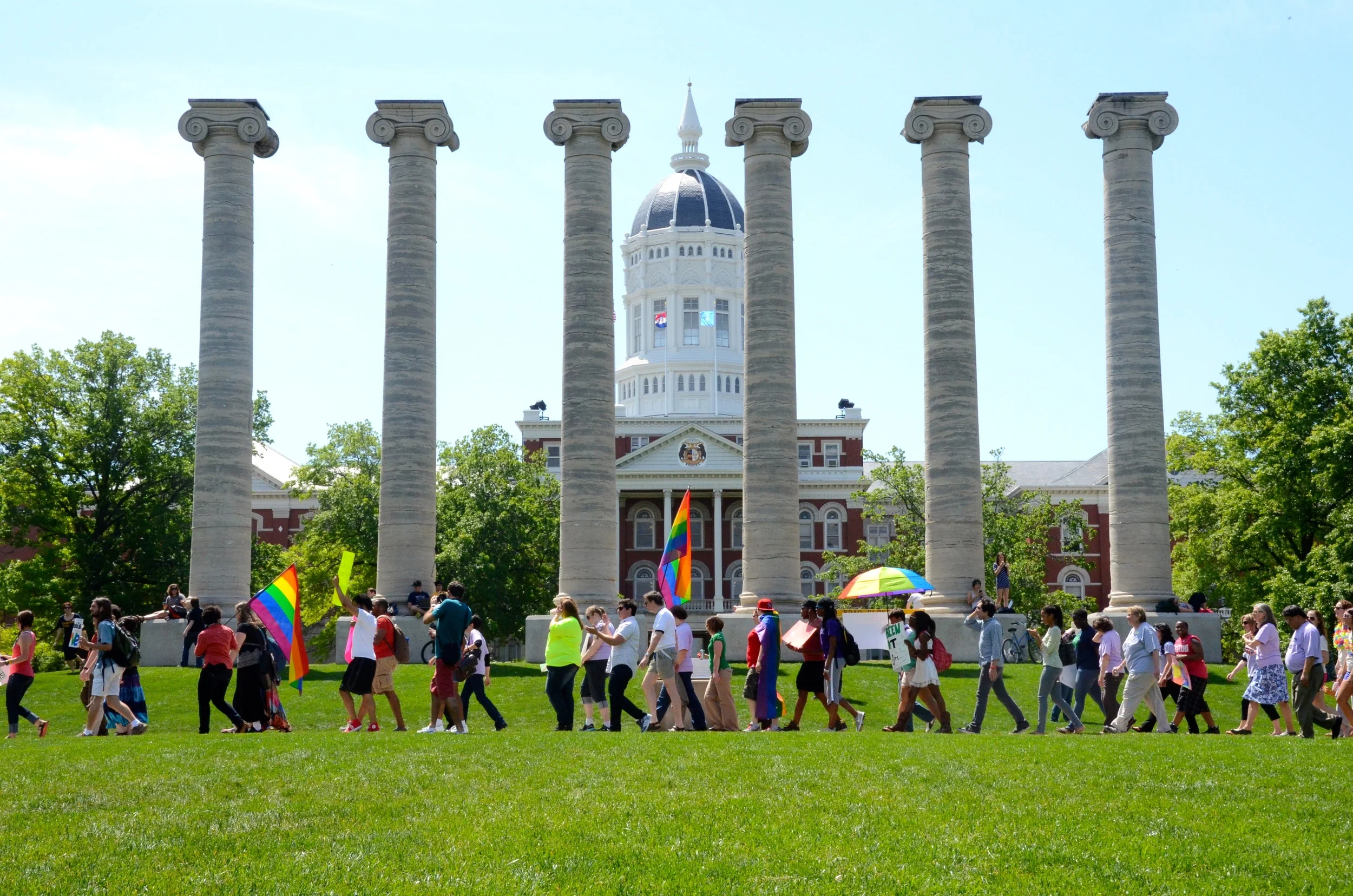  MU students and staff march through the Francis Quadrangle during the first ever Pride Parade put on by the LGBTQ Resource Center.&nbsp; 