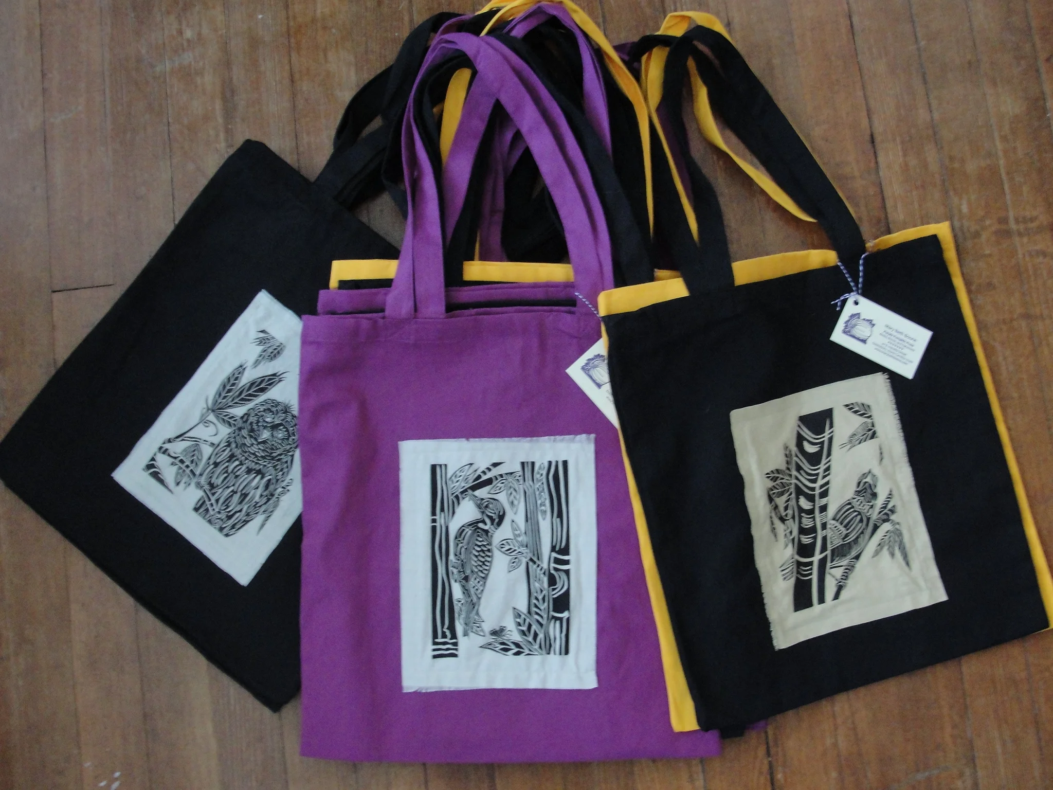 I printed several birds on cotton muslin. I then sewed them to cotton canvas bags....so much better than paper or plastic! 