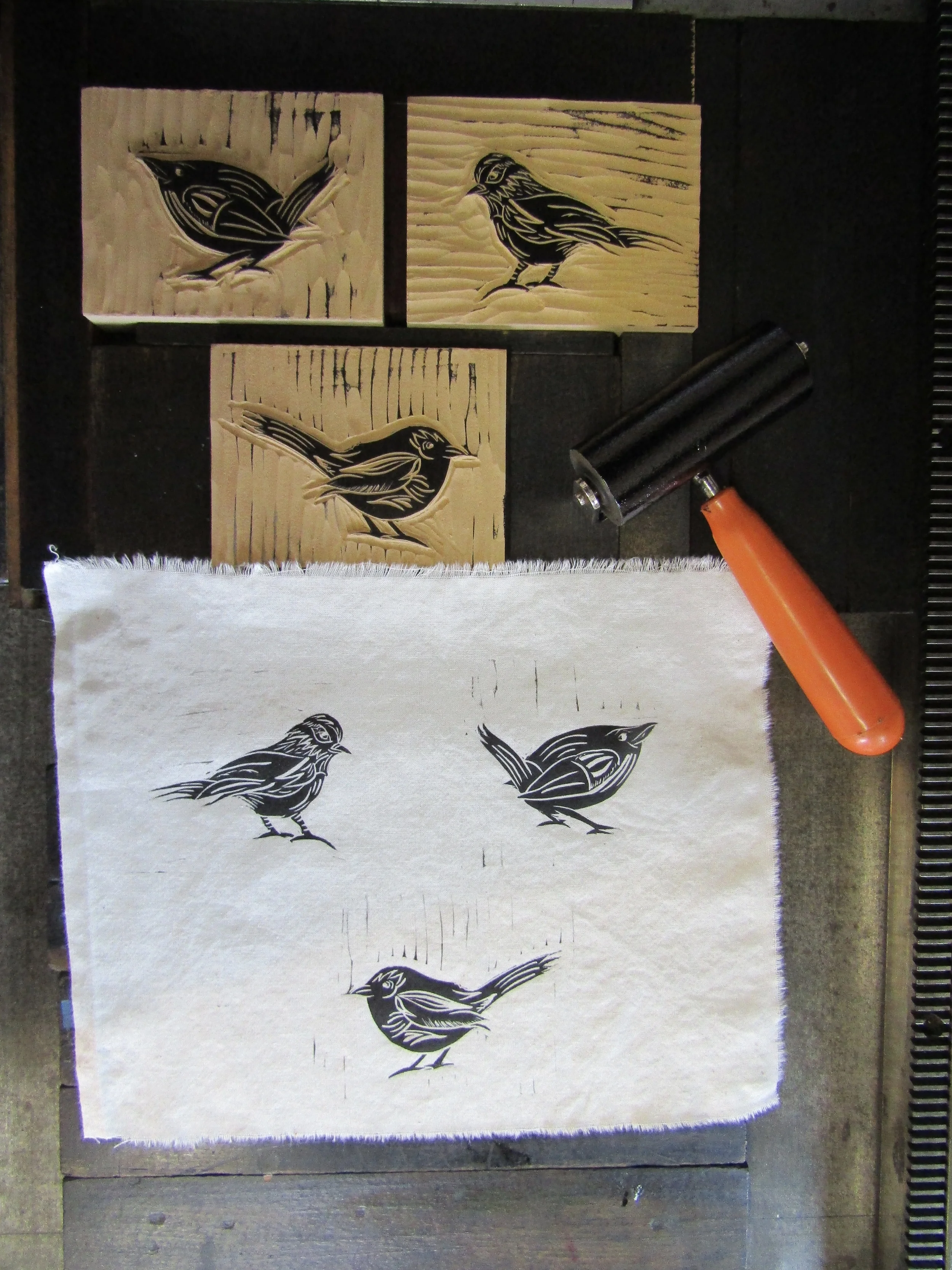 Printing the birds on cotton muslin.