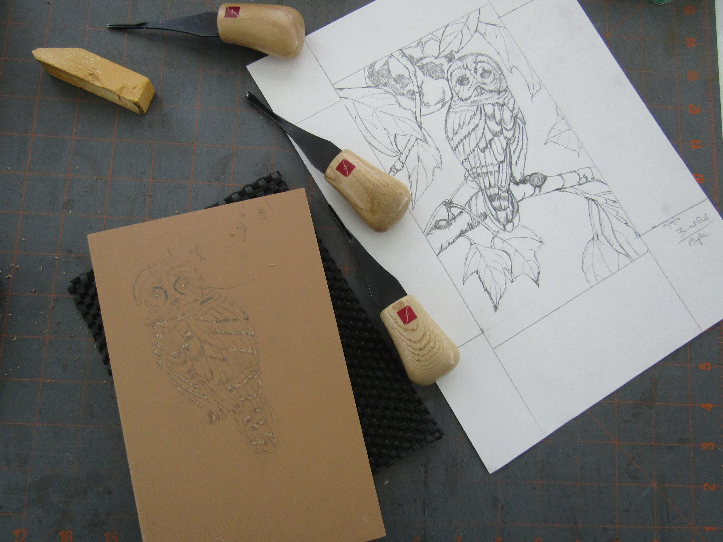 The beginning stages - I am carving out what will remain white on thie print. 