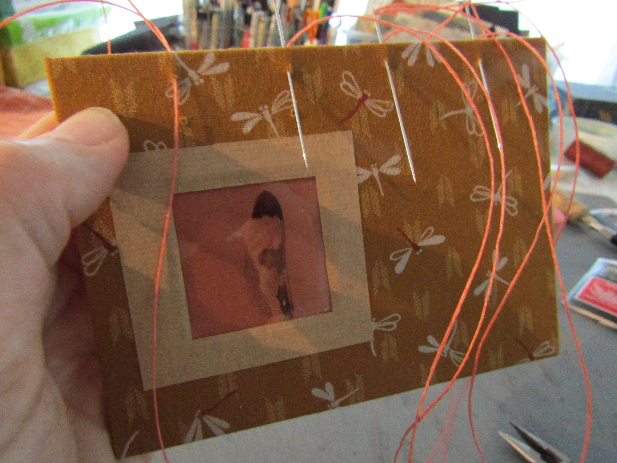 Starting to sew a Coptic book - using four needles!