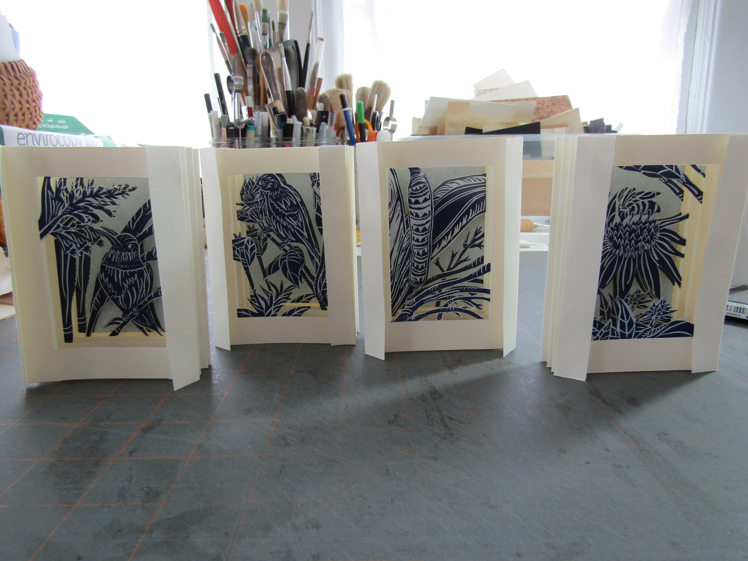 Four are assembled - so pleased! I must now design a cover for the books. I plan on using a case binding. I will explore sizes and materials through building a model (or two).