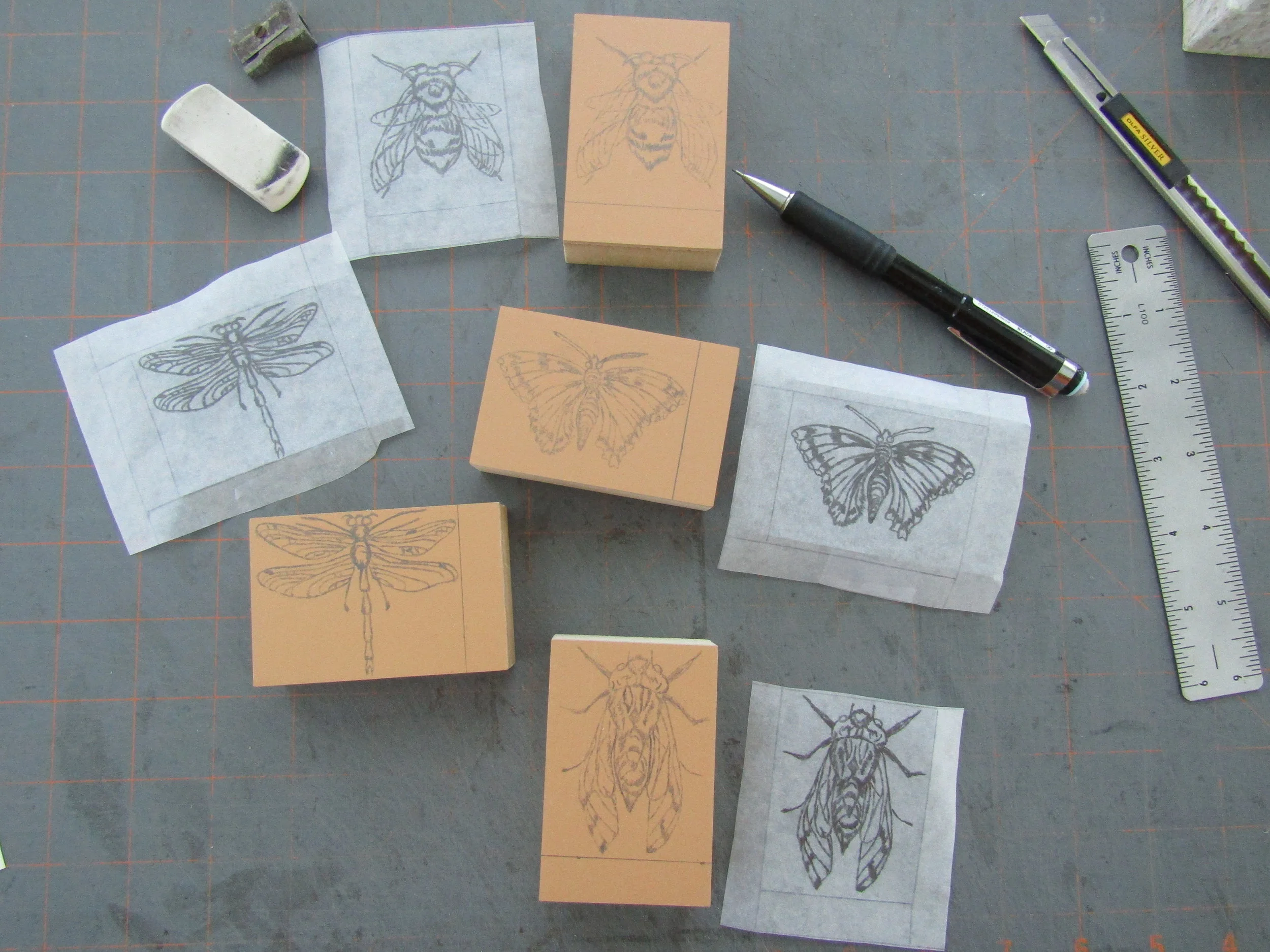 Drawings transferred to blocks, now ready to carve.