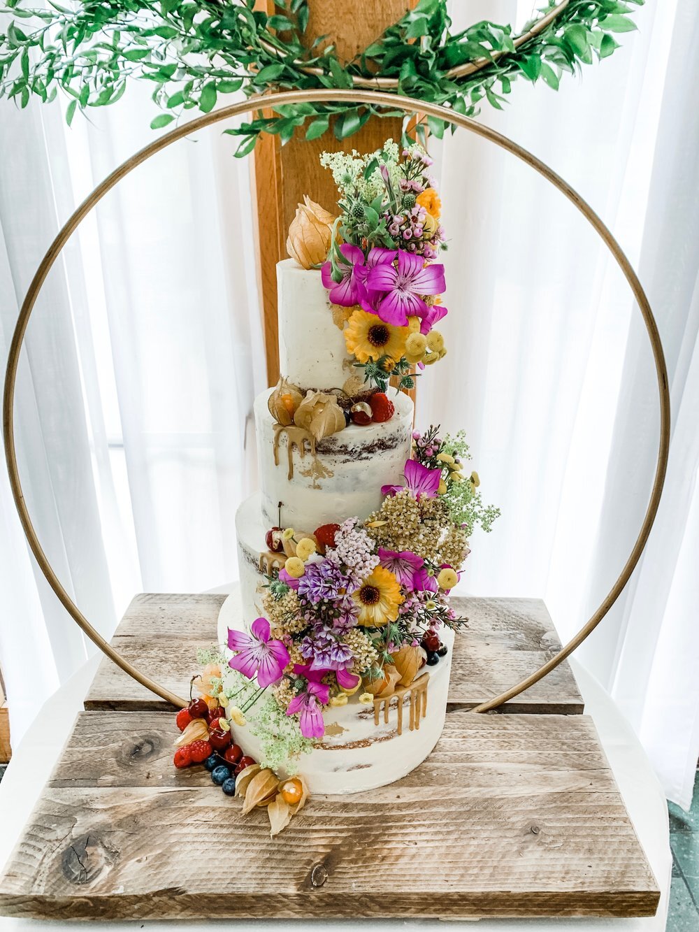 Fresh wild flower semi naked cake at The Oak Tree Of Peover By Stevie Jay Photography-min.jpg