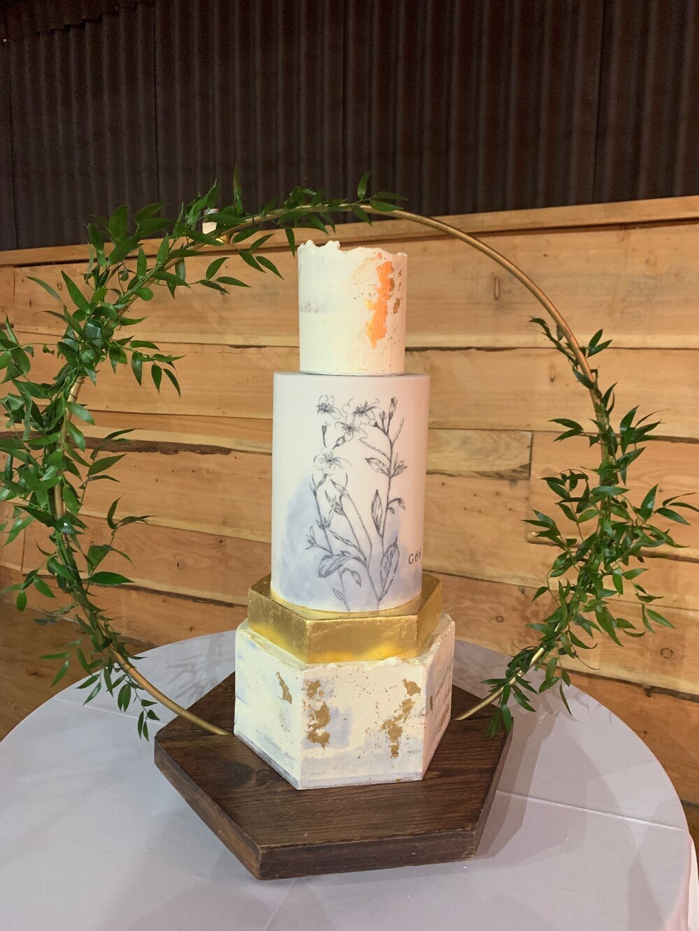 Rustic+semi+naked+white,+blue+and+gold+hand+drawn+floral+geometric+wedding+cake+with+gold+leaf+at+Stock+Farm.jpg