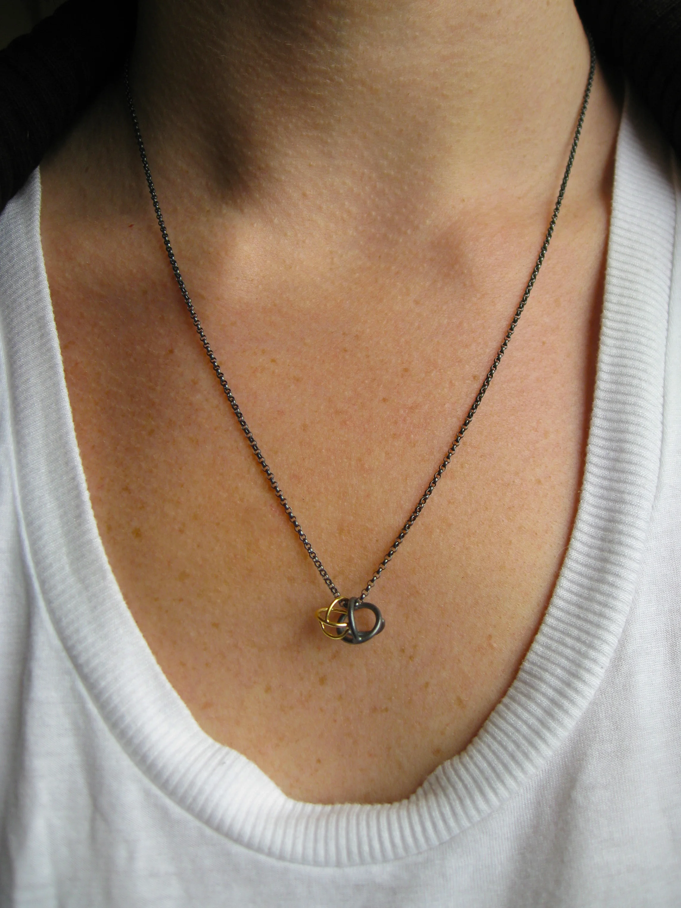 Double Gyroscope Necklace - Oxidized Silver and 18 karat gold