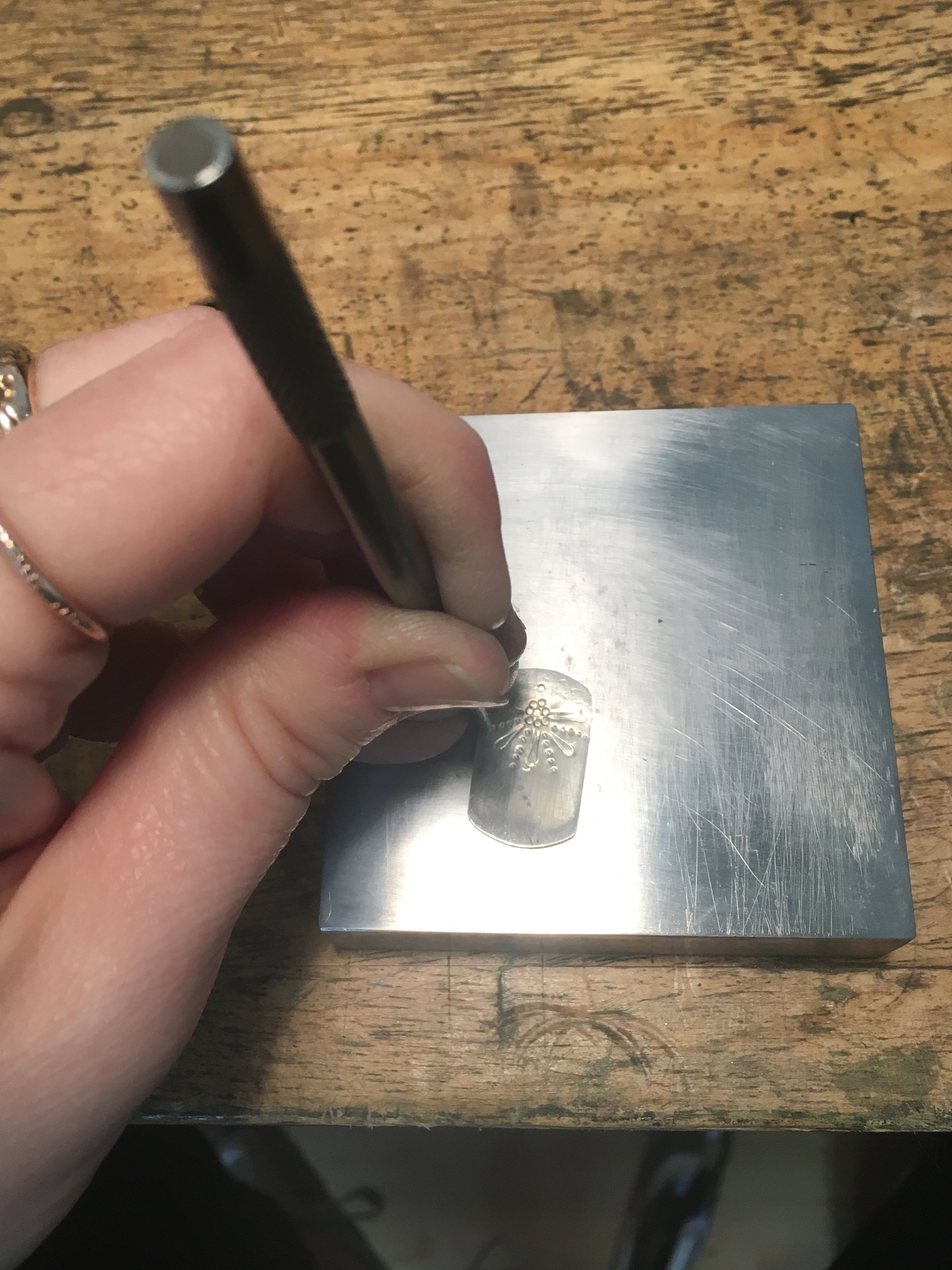 Stamped+dog+tag+necklace+in+progress.+Learn+how+to+stamp+your+own+at+one+of+our+workshops%21.jpg