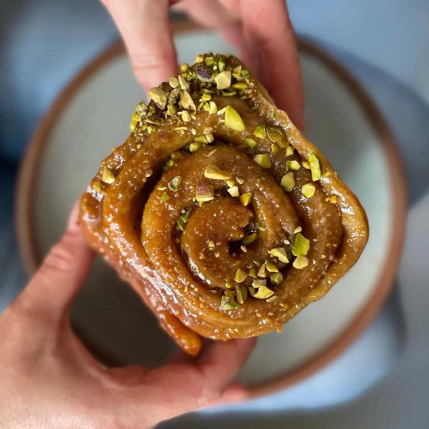 New kid in town: this beautiful brown buttery pistachio sticky bun @kfar_bk by @mikesolomonov