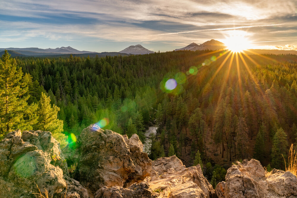 The Sun Sets Over Three Sisters Mountains In Bend Oregon