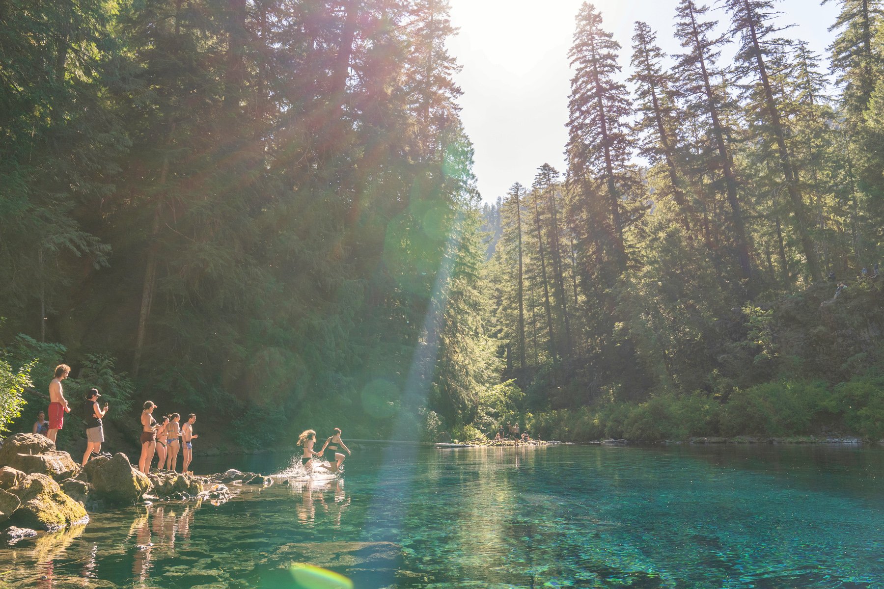 People Swim in the Blue Pool in Oregon