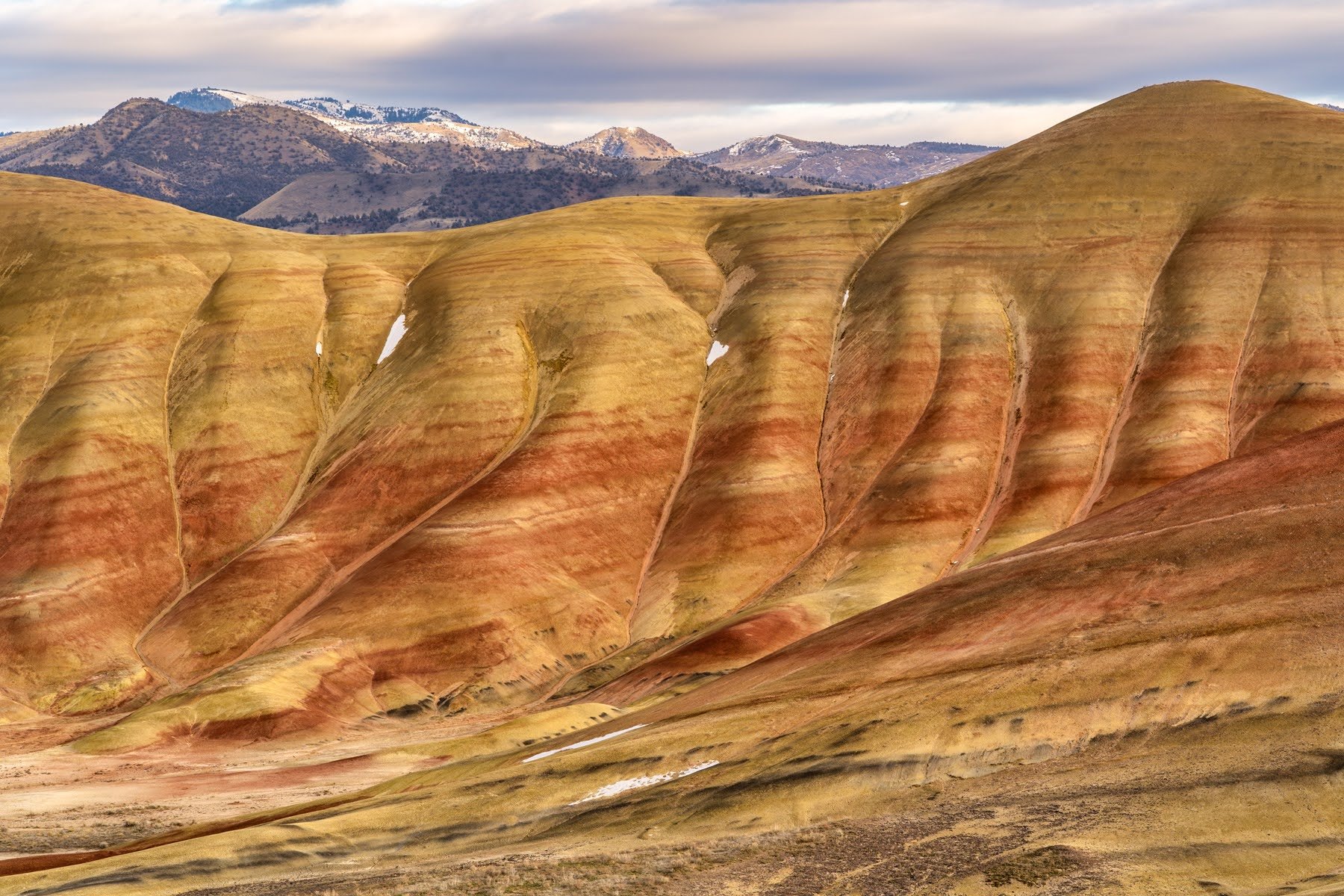 John Day Fossil Beds Painted Hills Unit in Oregon during sunset.