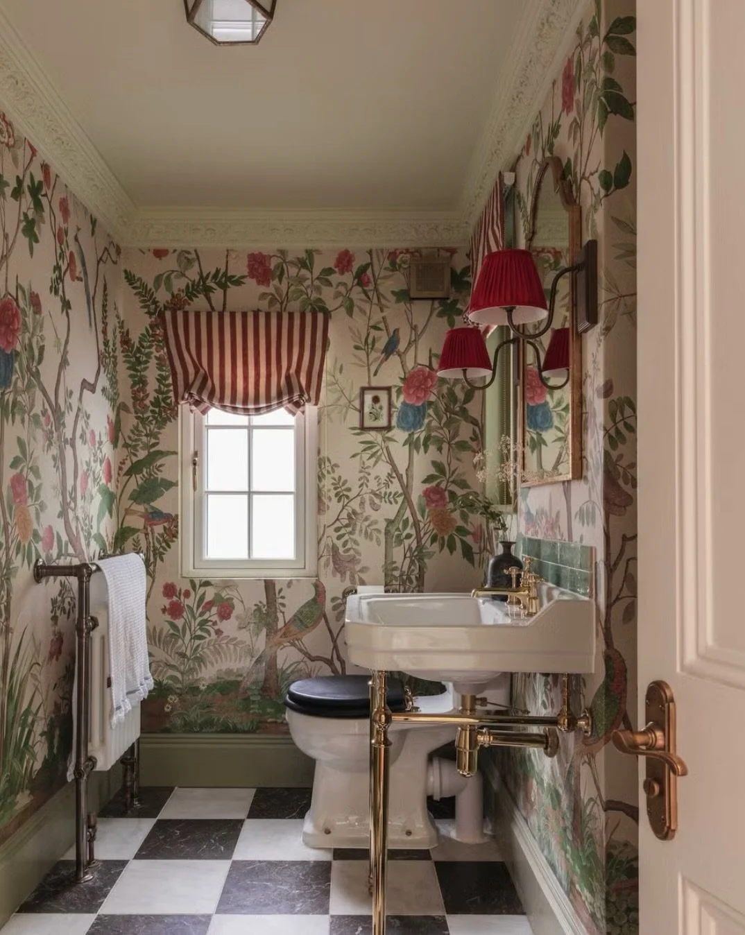 Lovely to see our Queen of Hearts powder room featured in @housebeautiful.

A miniature jewel box of a cloakroom, filled with Alice in Wonderland magic&hellip;and just enough restraint to make it a grown up kind of wonderful. 🪄

#interiordesign #int