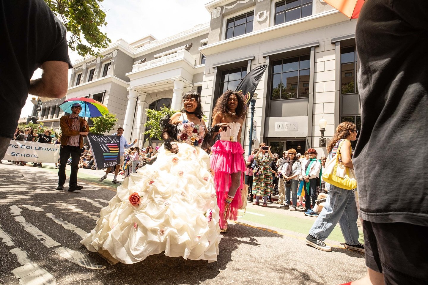 Check out these two amazing individuals in stunning dresses, bringing flair and fabulosity to the parade! Their style perfectly embodies the spirit of Pride and the joy of self-expression.

Stay tuned for more highlights from our unforgettable 50th a