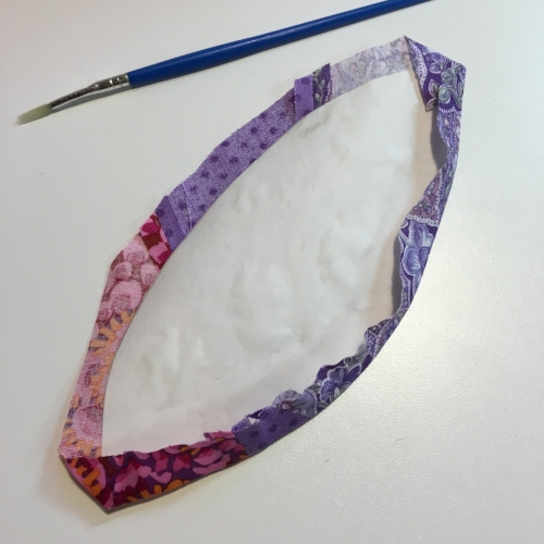 Lower edge of the petal pressed toward the template