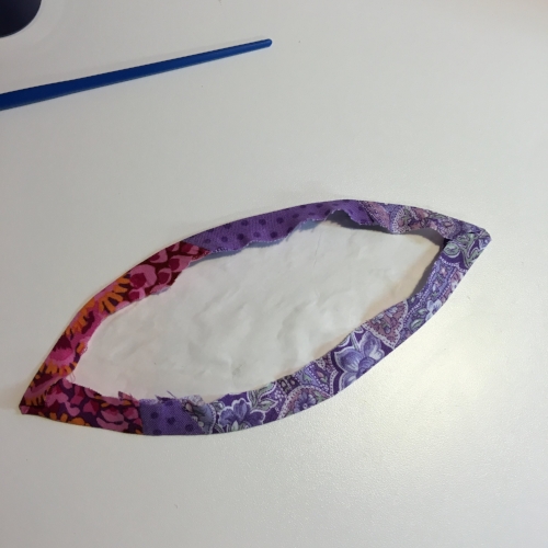 Each edge starched and pressed into place