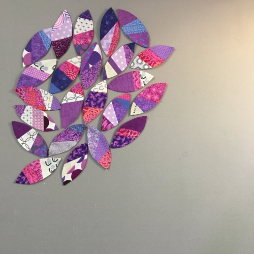Trying different placement of appliqués on my design wall
