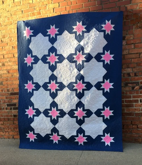Maker: Jessie Zeigler (that’s me and you are on my website!) Pattern: Cora by Jessie Zeigler of Threaded Quilting Studio Custom quilted by me.