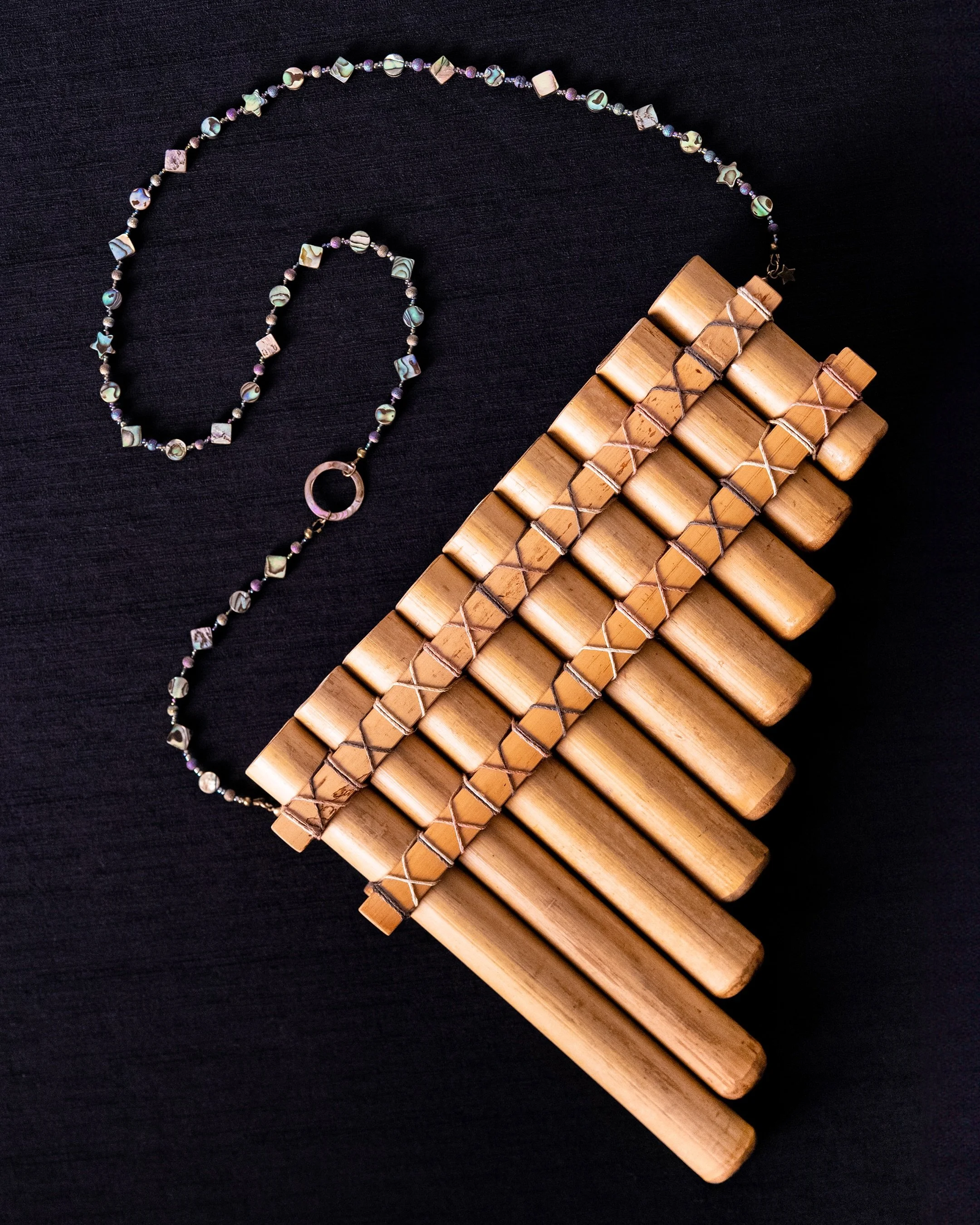 WINDS OF CHANGE ✶ I crafted this pan flute from bamboo, twine, abalone and glass beads. The detachable necklace features a star charm, a little touch I&rsquo;ve included on past necklace creations.

It was exciting to mix my passions for sound and cr