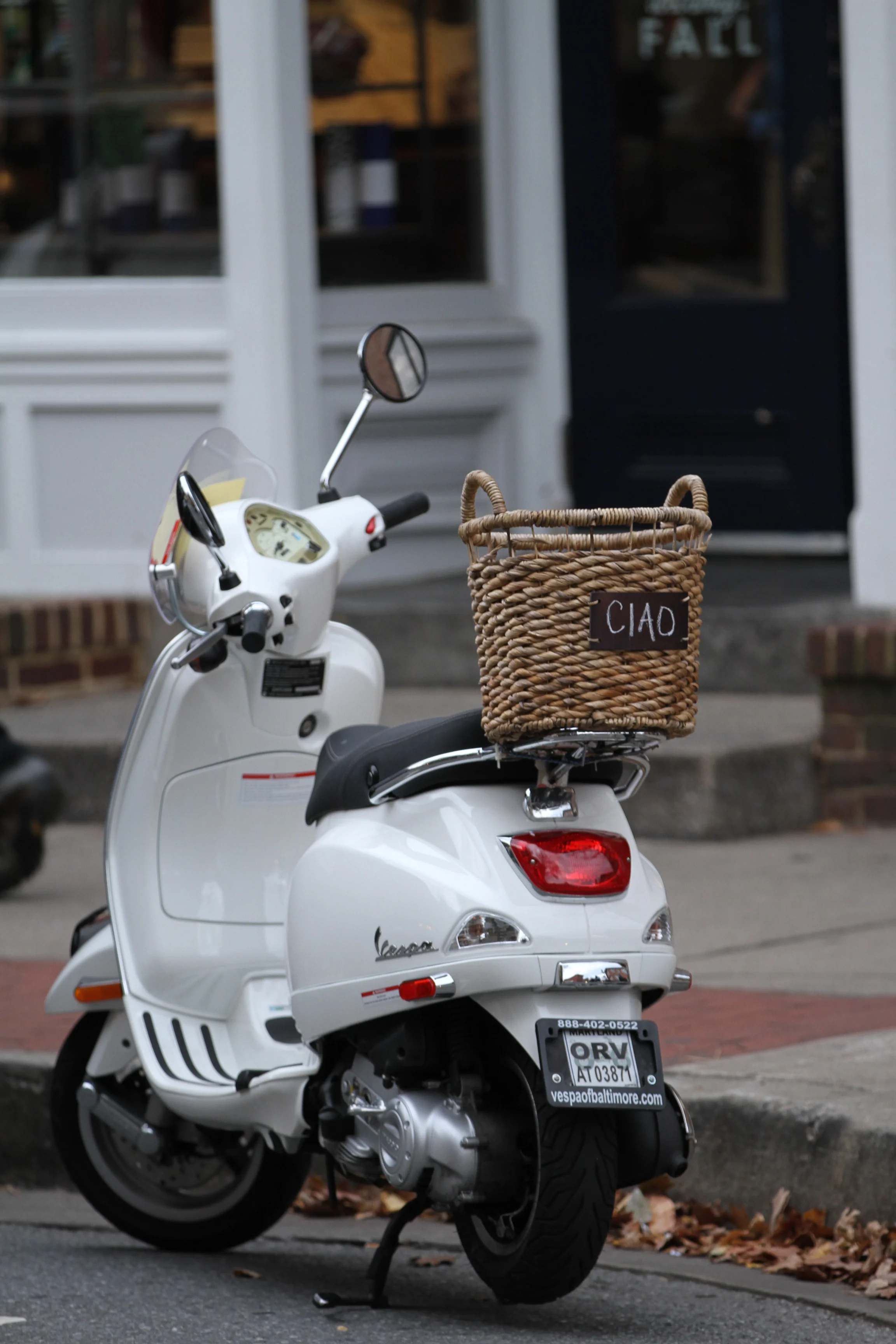 Adorable white vespa in downtown frederick