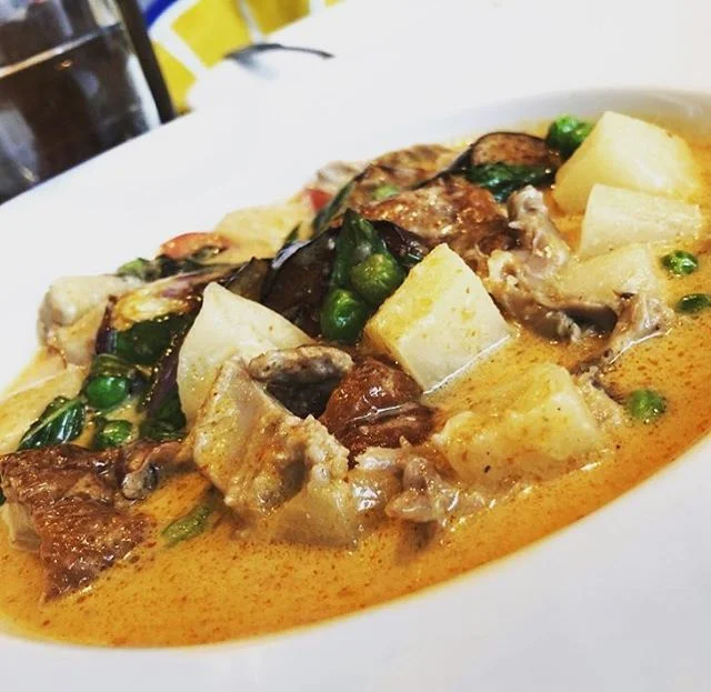 Amazing view of our roasted duck curry simmered in red curry sauce. Potatoes, carrots, peas, and basil! 🍛 🍛 🍛