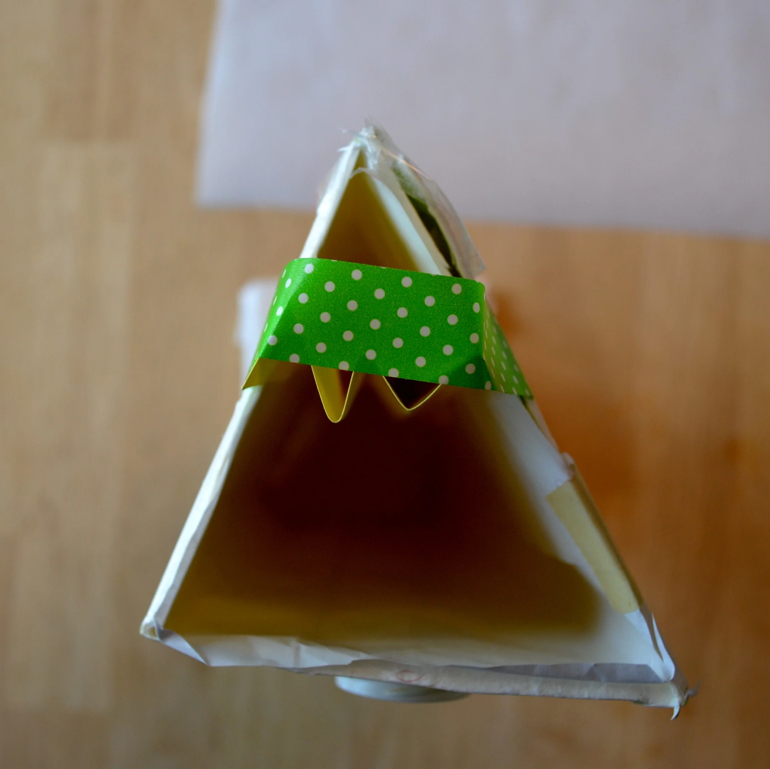 Alas, she is fastened with the ever-popular washi tape.