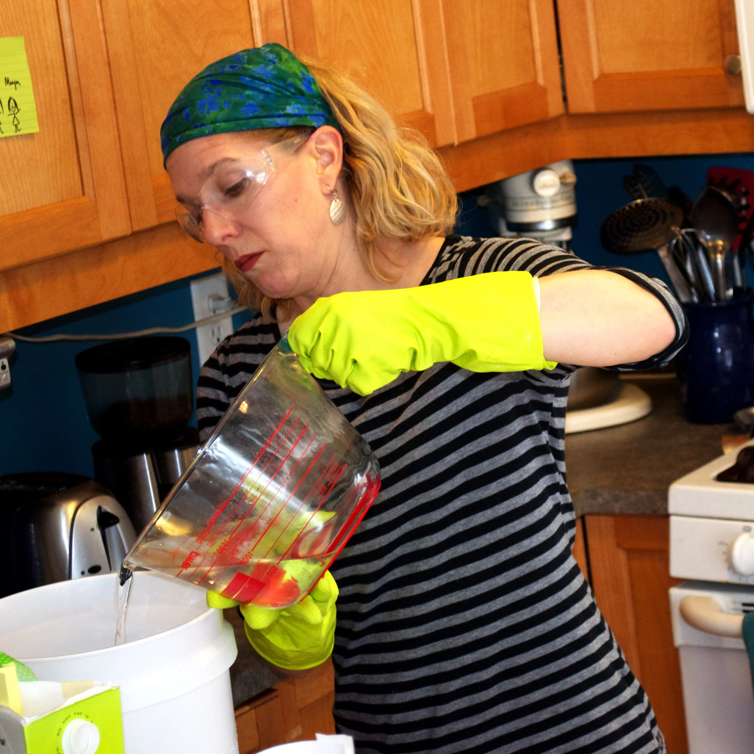 Here I am, mixing the lye water to the oils.